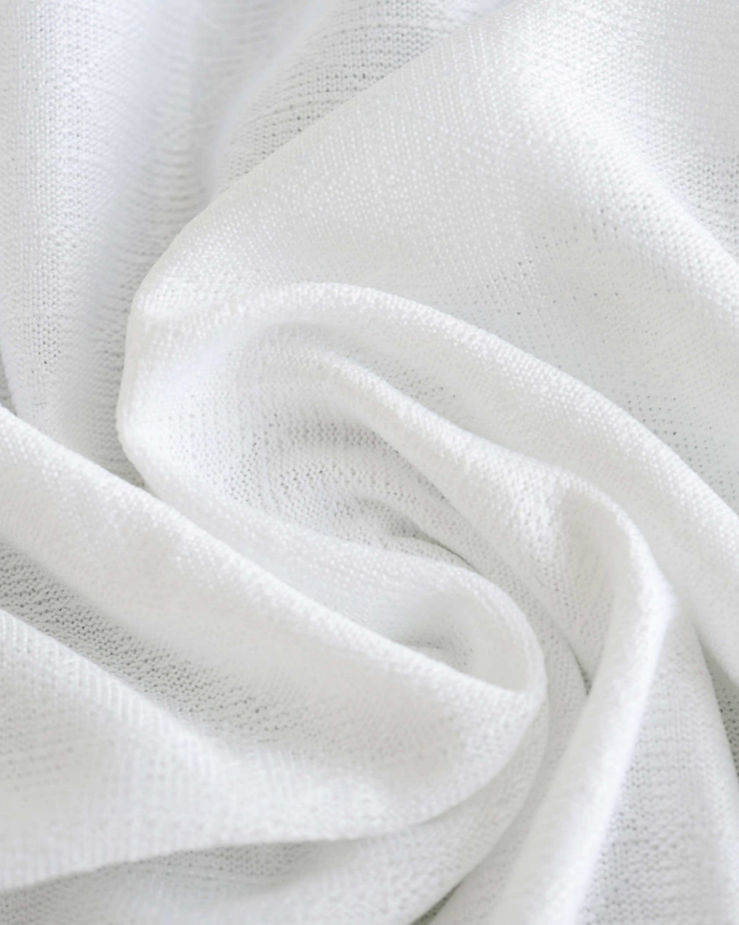 White AC Milan away football jersey 2024/25 close-up of textured pinstripe knit fabric