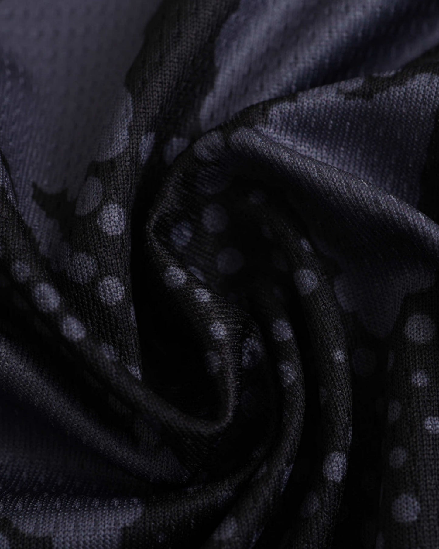 AC Milan goalkeeper football jersey 2024/25 close-up of black and grey patterned fabric