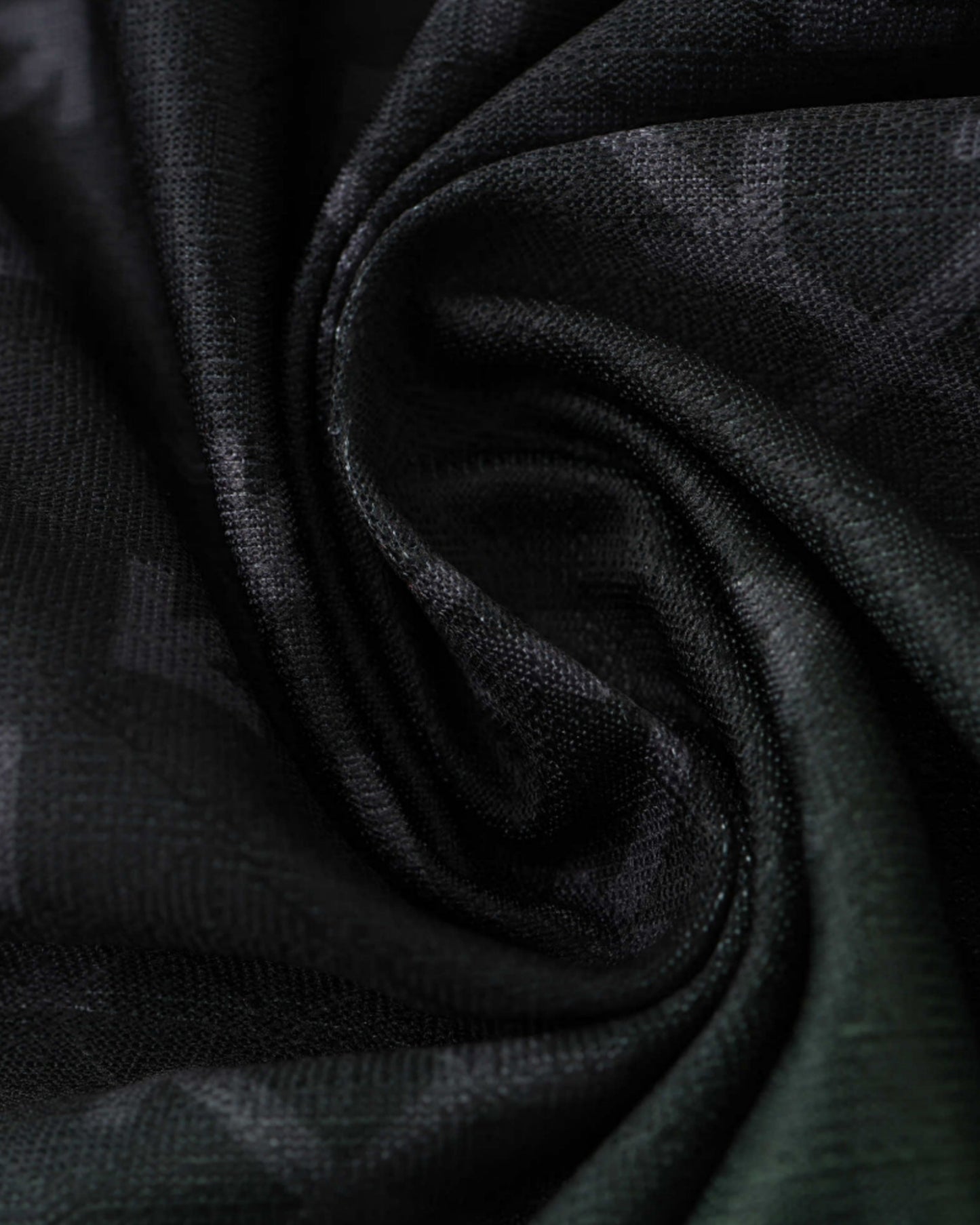 Close-up of the black Off-White arrow monogram fabric on the AC Milan collaboration football jersey