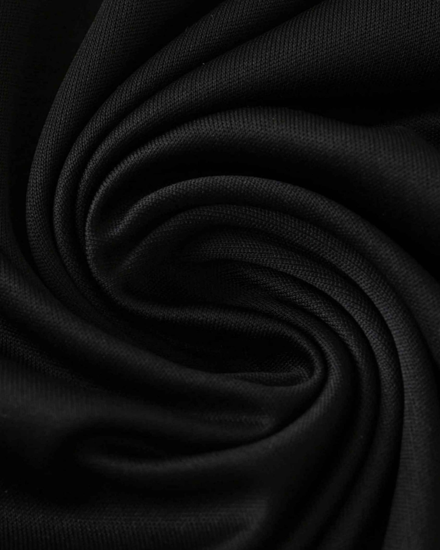 Close-up of black breathable training fabric on the Al Nassr 2024/25 football jersey