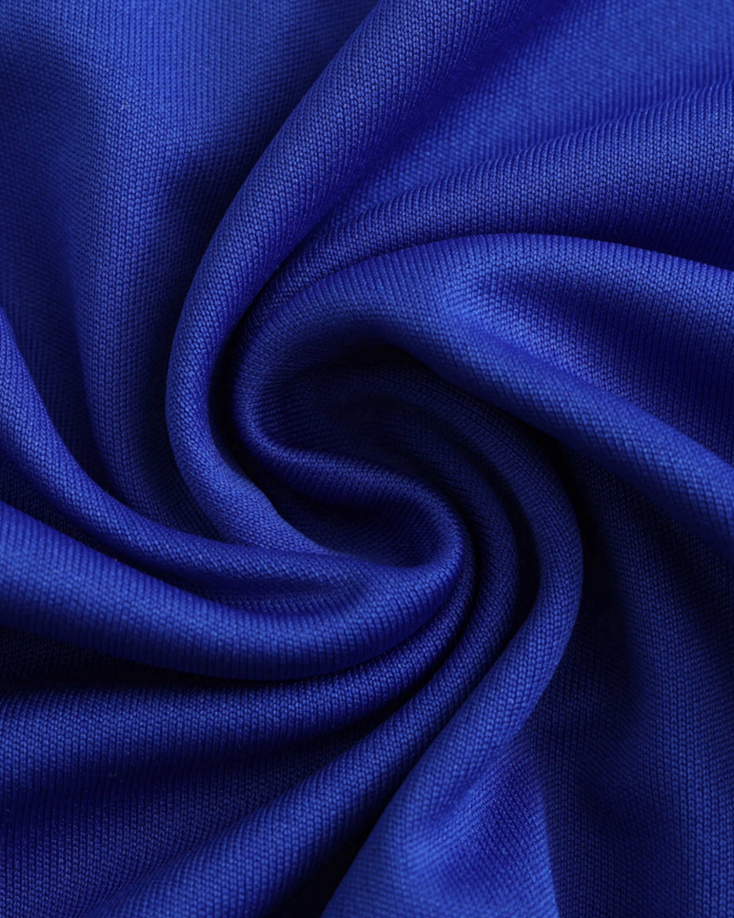 Close-up of royal blue textured knit fabric of Argentina 2024/25 away football jersey