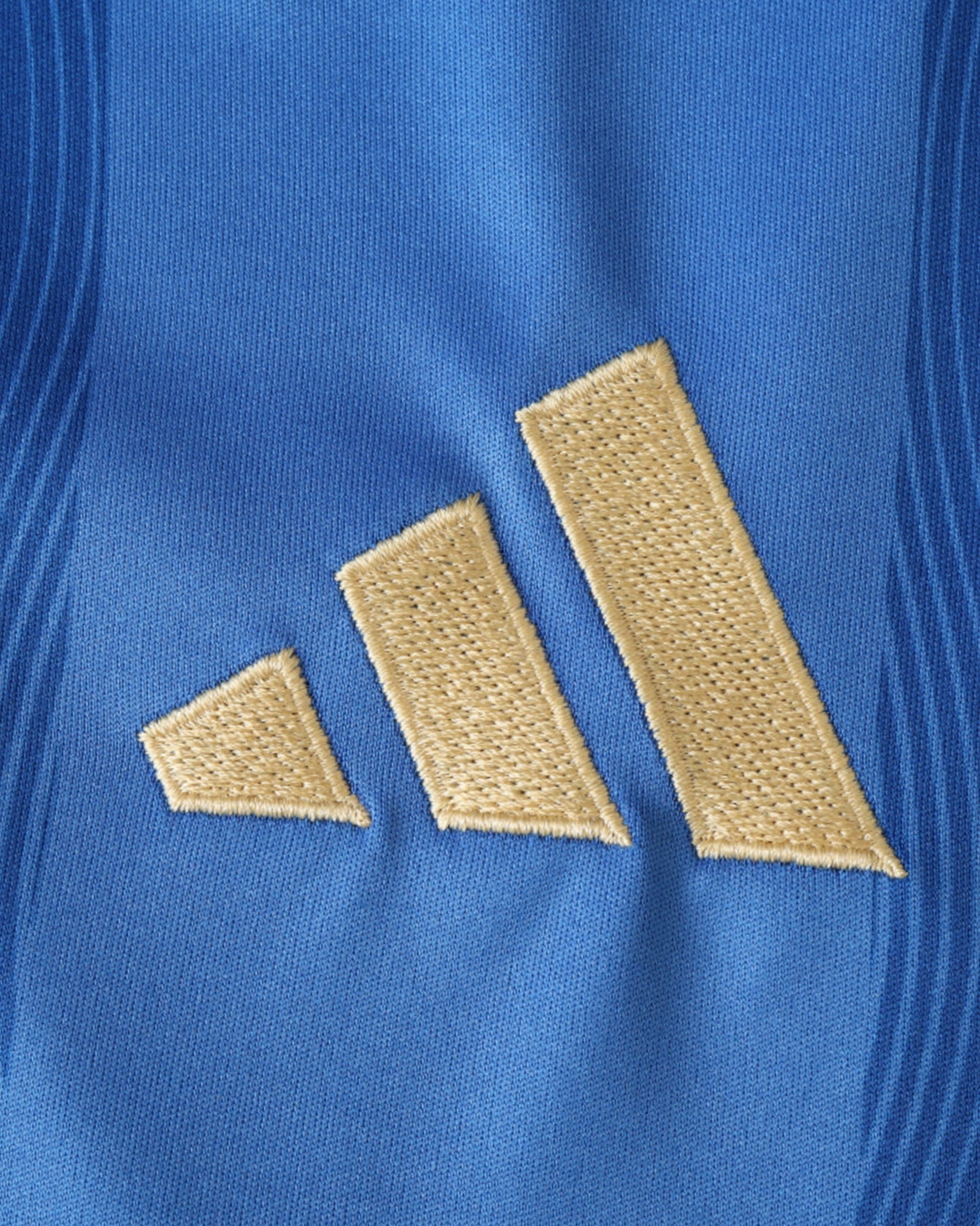 Embroidered gold adidas logo on blue Argentina Blue Ocean football jersey