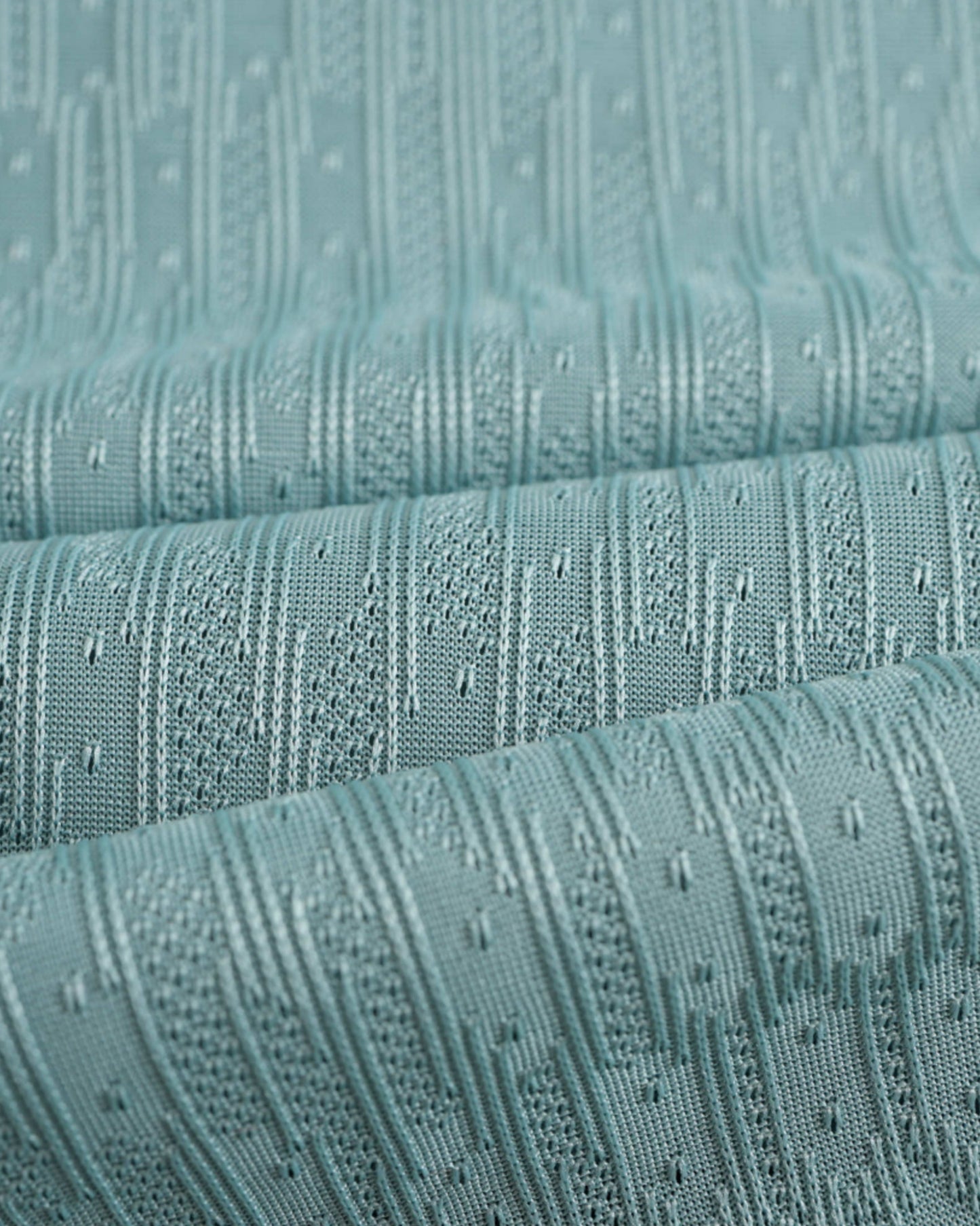Atletico Madrid away football jersey 2024/25 close-up of mint green ribbed knit fabric