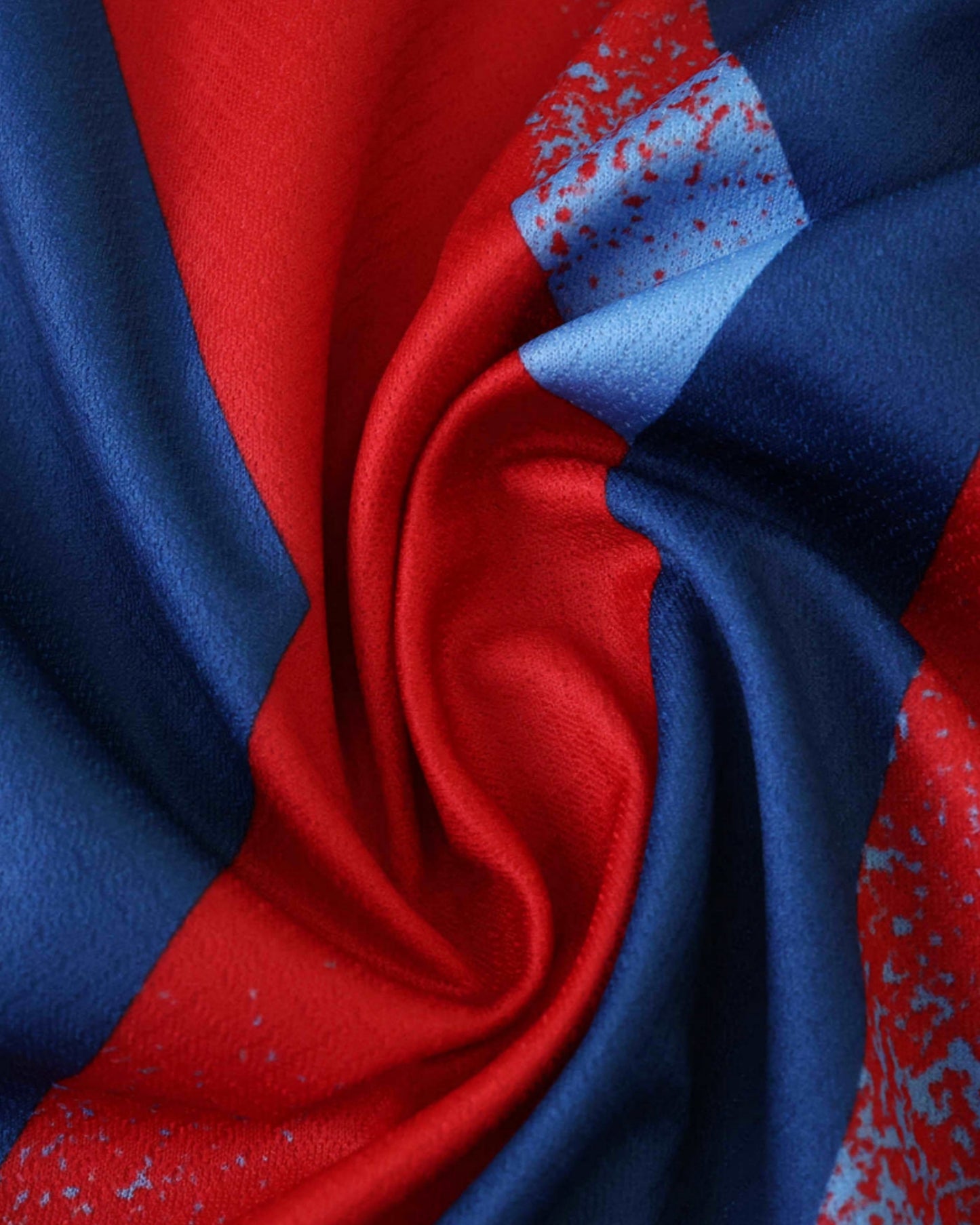 Close-up of the red and blue fabric of the Barcelona Fourth football jersey 2025/26