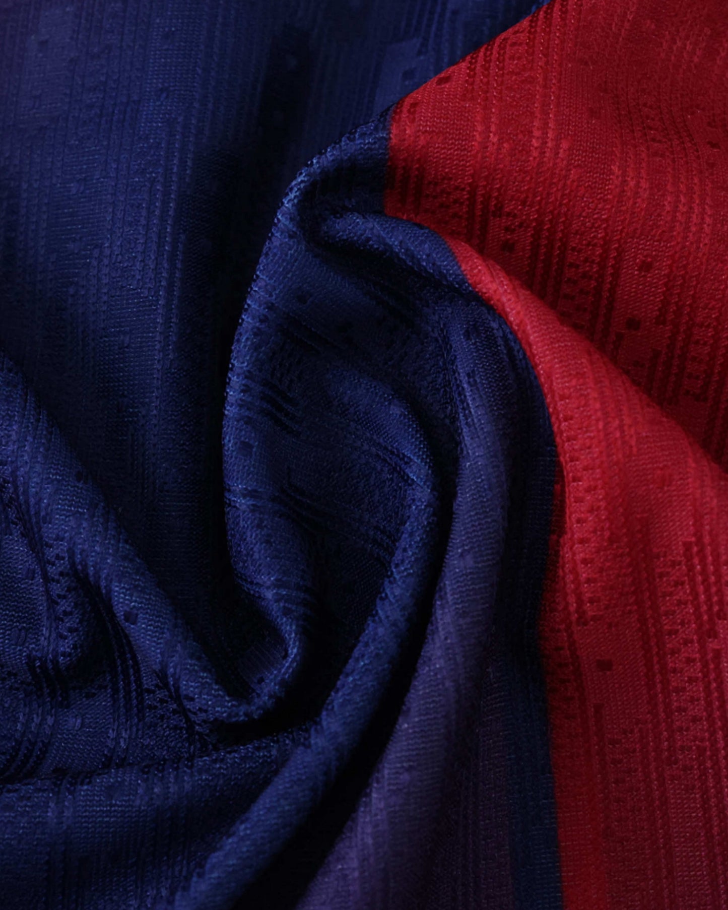 FC Barcelona home football jersey 2025/26 close-up of blue and red textured stripe fabric