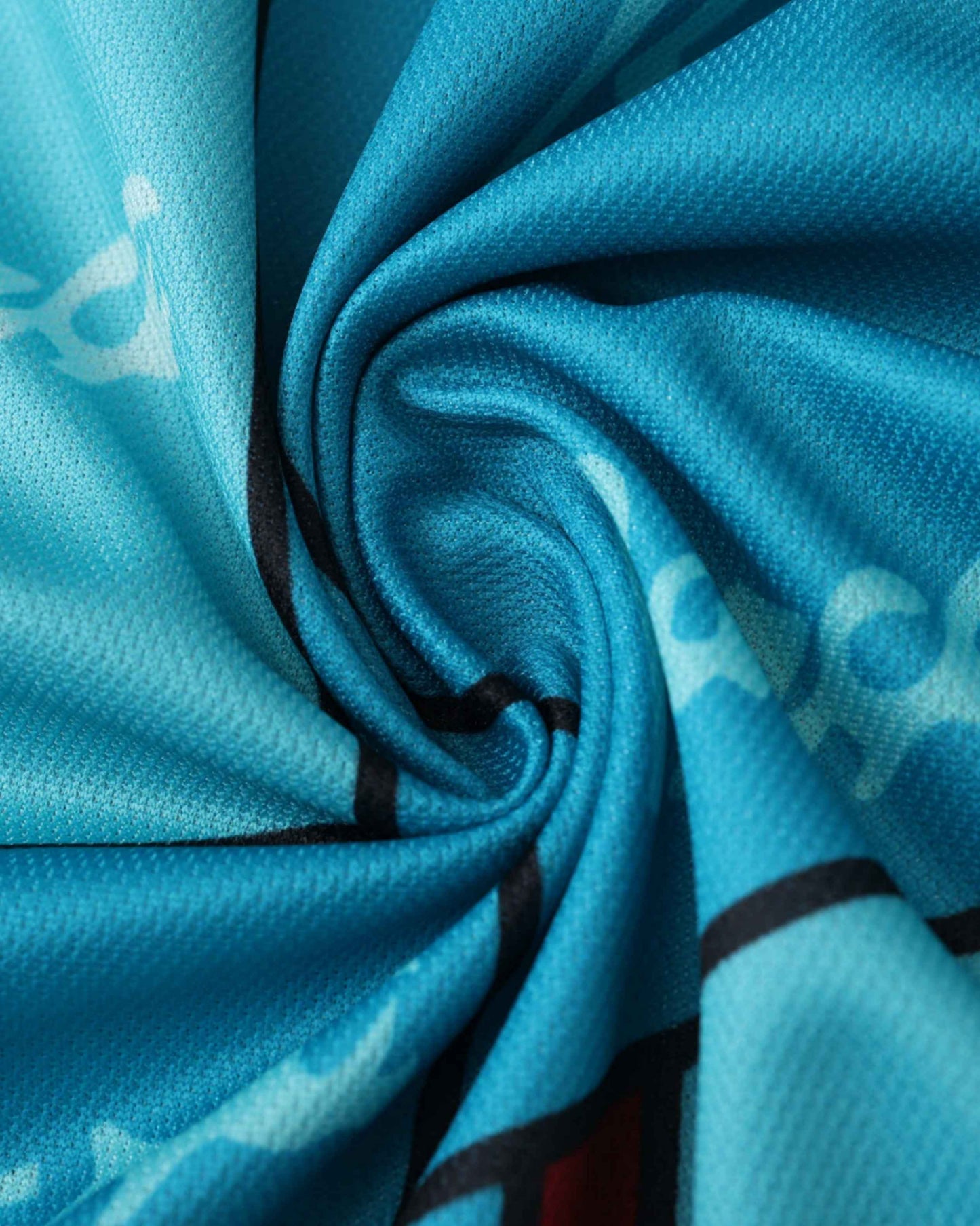 Barcelona retro away jersey 1996/97, close-up of textured blue fabric.