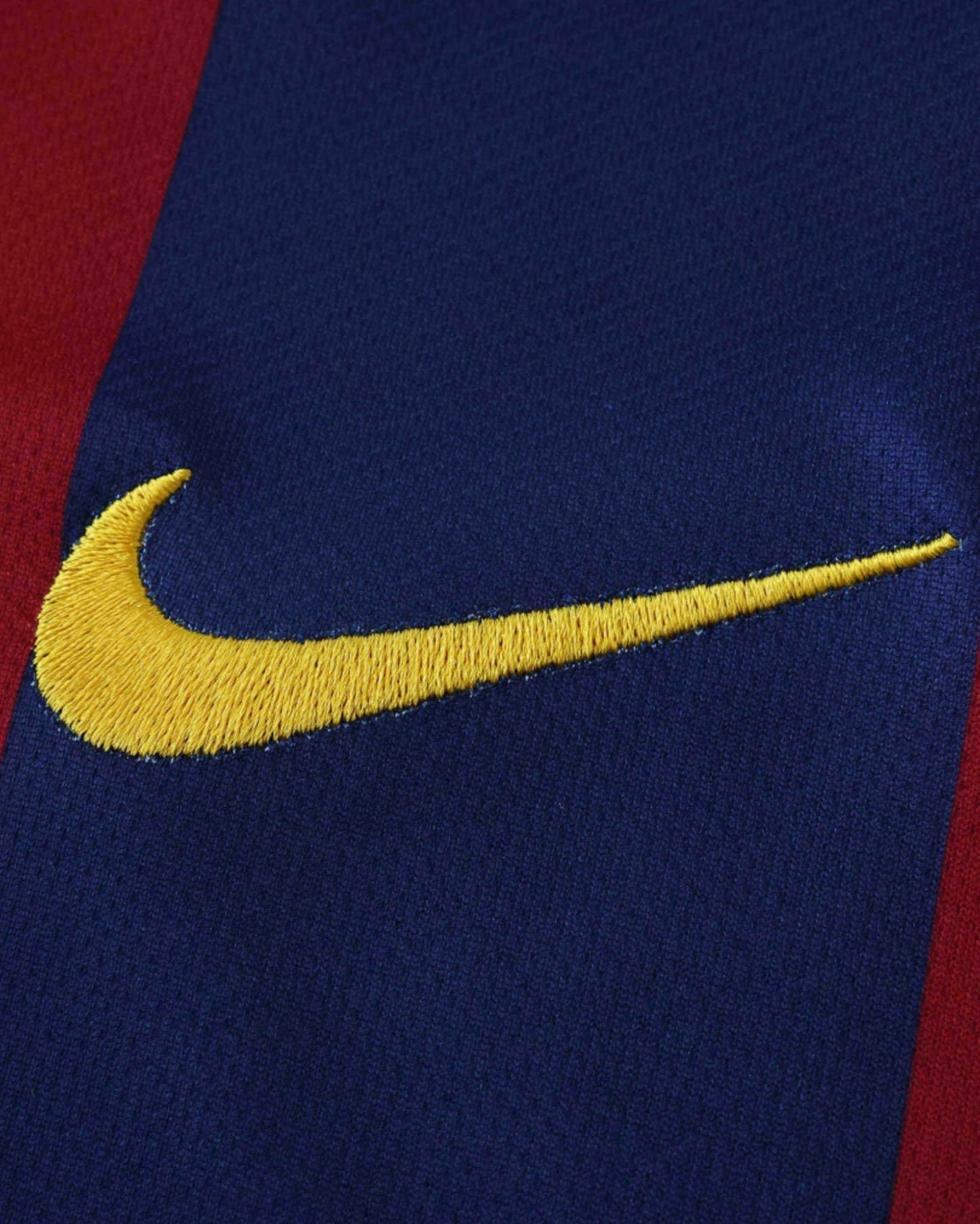 Gold Nike swoosh on blue and red striped Barcelona 2014/15 retro home kids football jersey