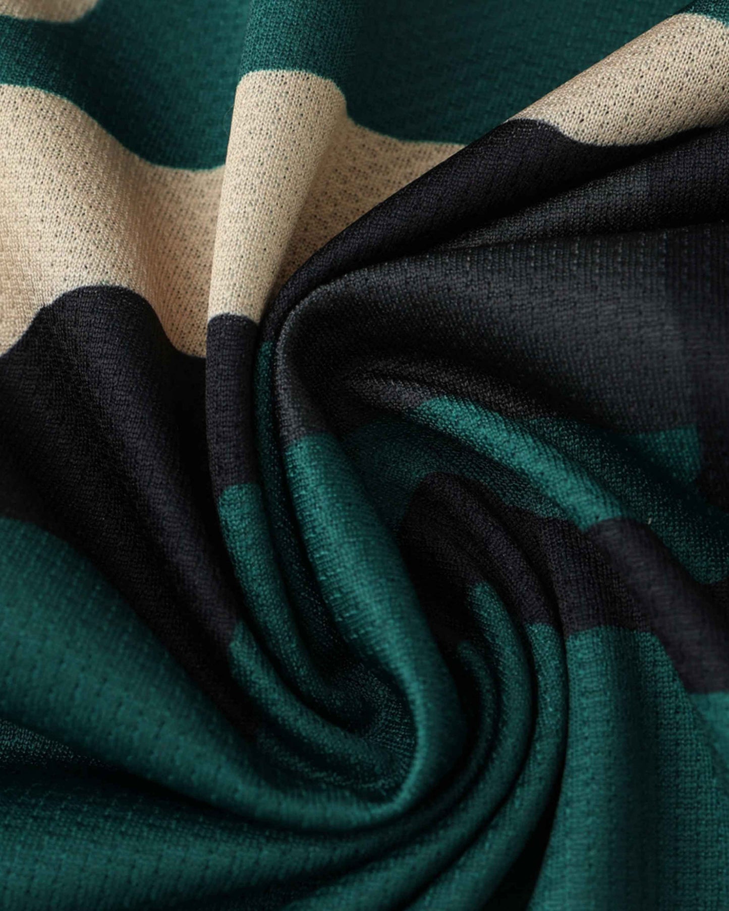 Striped training jersey with green, black, and beige bands.