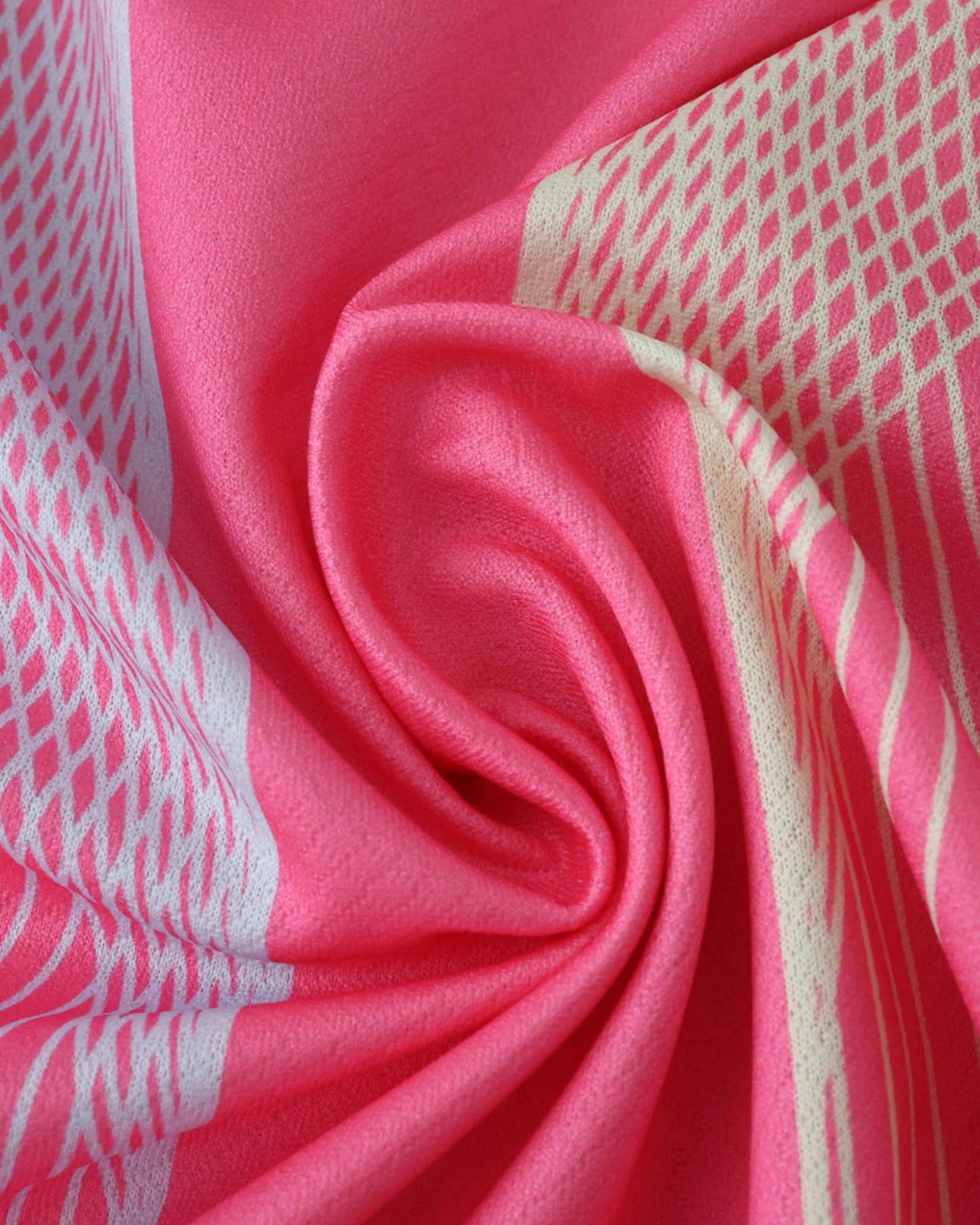 Barcelona x Aurora premium football jersey close-up of pink fabric with white diamond and stripe pattern