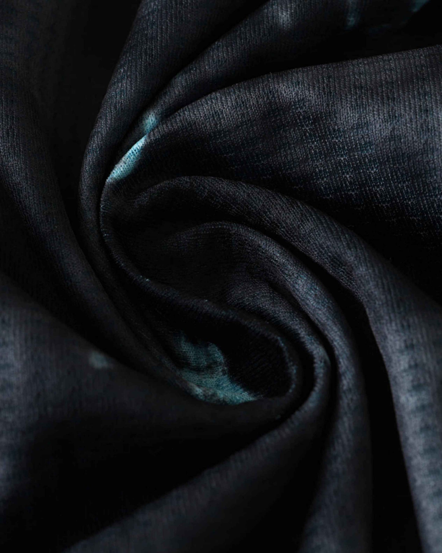 Bayern Munich 2024/25 away jersey in a dark, textured fabric.