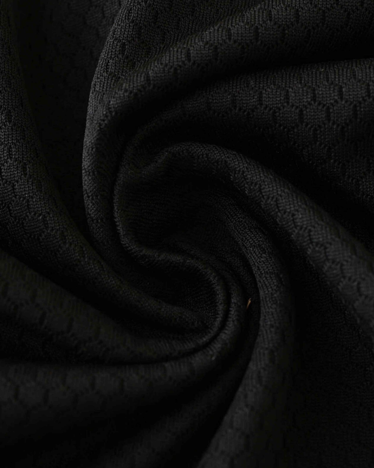 Black Footxo Bayern Munich 2024/25 training jersey with a textured pattern.