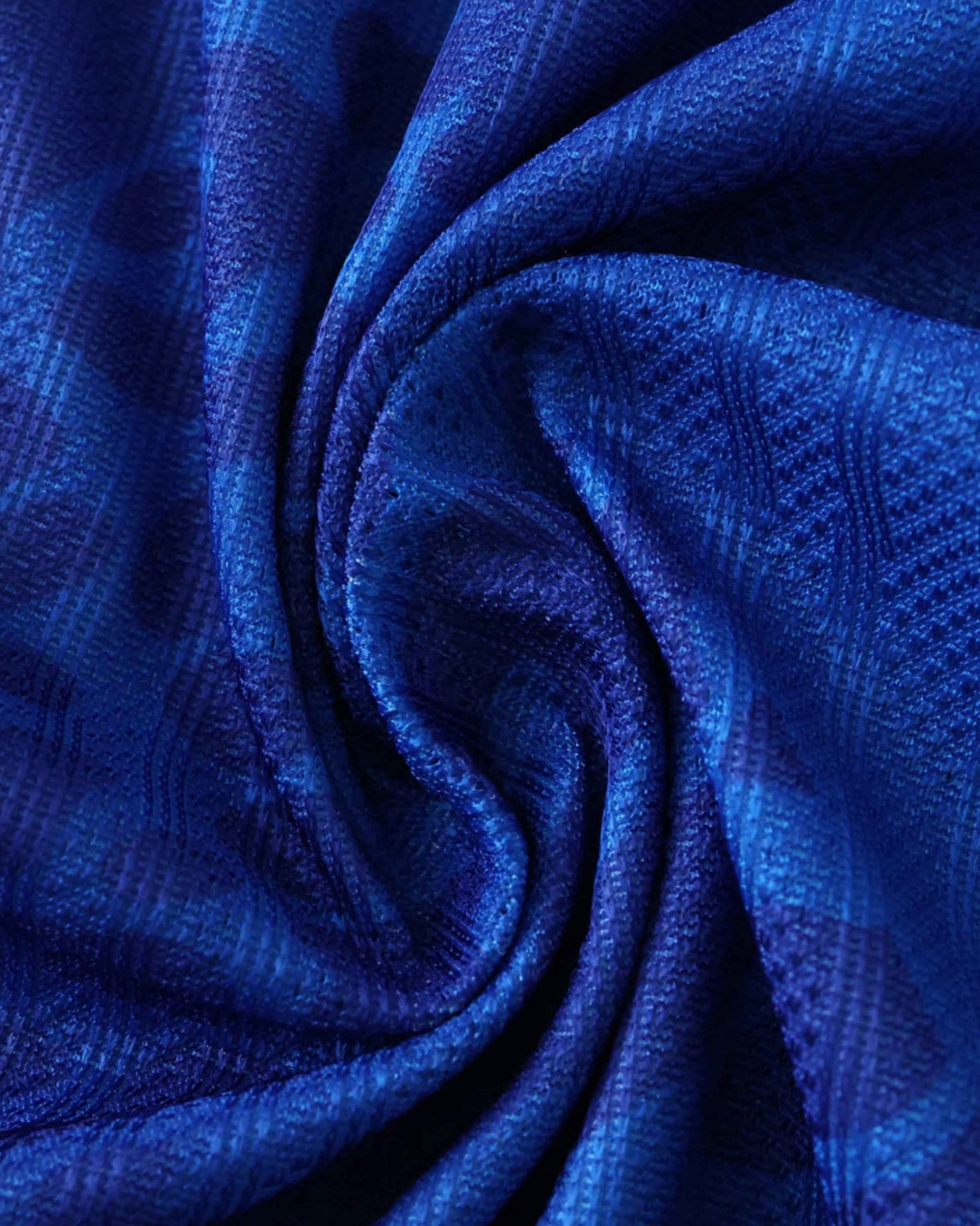 Close-up of blue textured diamond-pattern fabric on Brazil away football jersey 2025/26