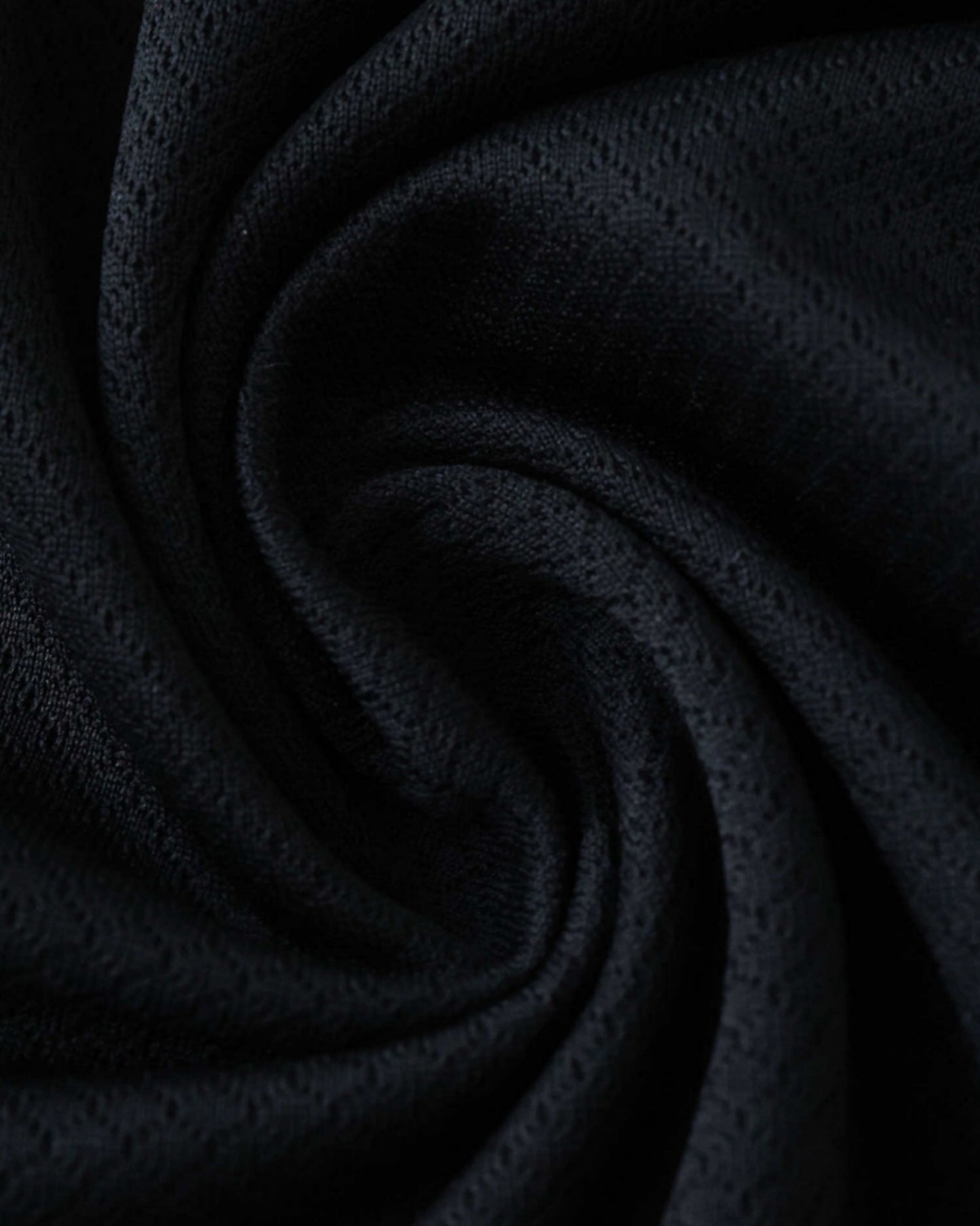 England away football jersey 2025/26 close-up of breathable black diamond-textured fabric