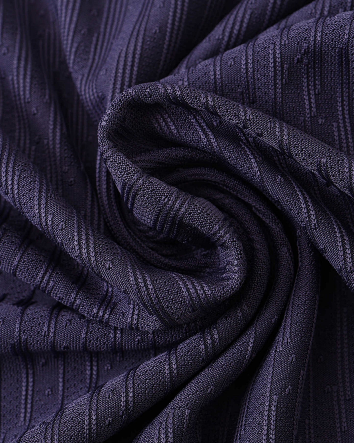 England UEFA Away football shirt 2024/25 close-up of textured ribbed purple fabric
