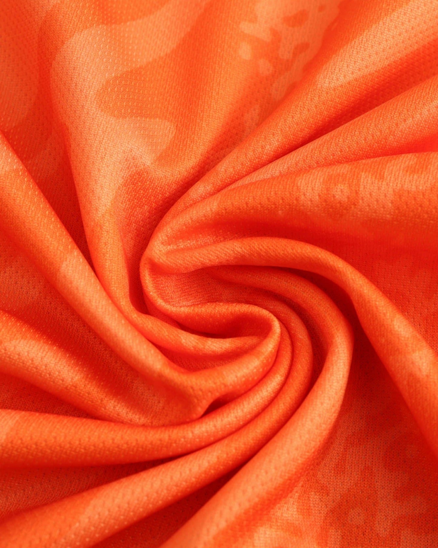 England UEFA goalkeeper football jersey 2024/25 close-up of breathable orange fabric texture