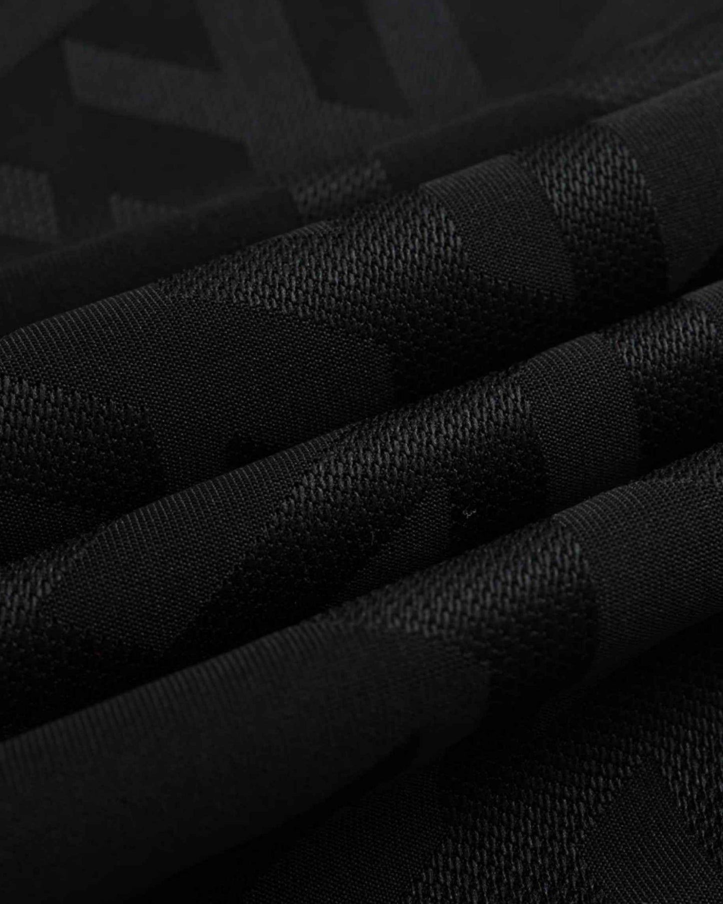 Black Germany UEFA football jersey 2024/25 with subtle tonal geometric pattern