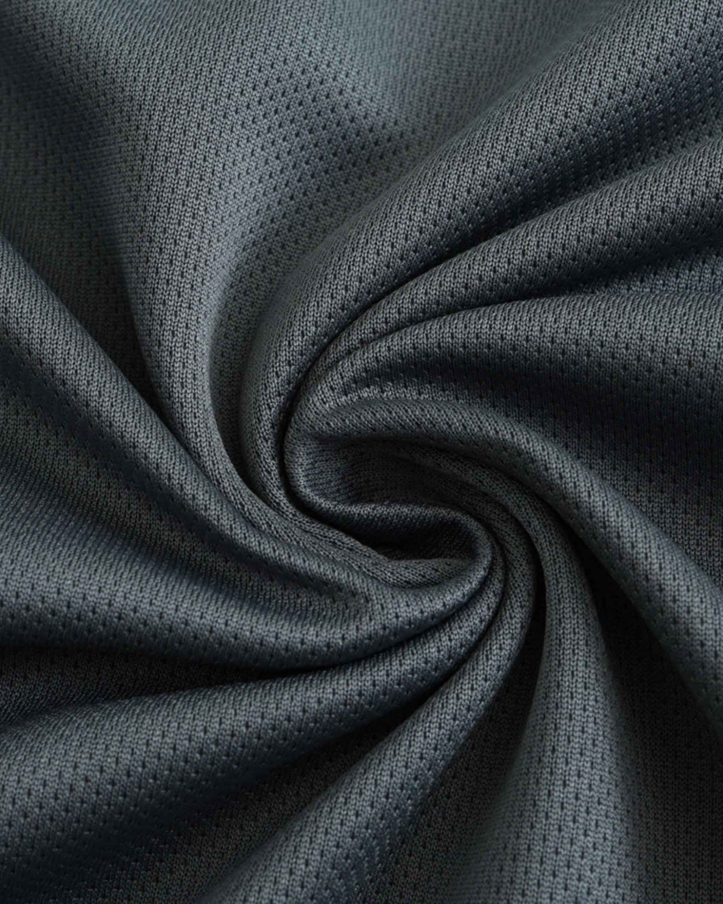 Dark grey textured mesh fabric detail of Germany goalkeeper football jersey 2024/25