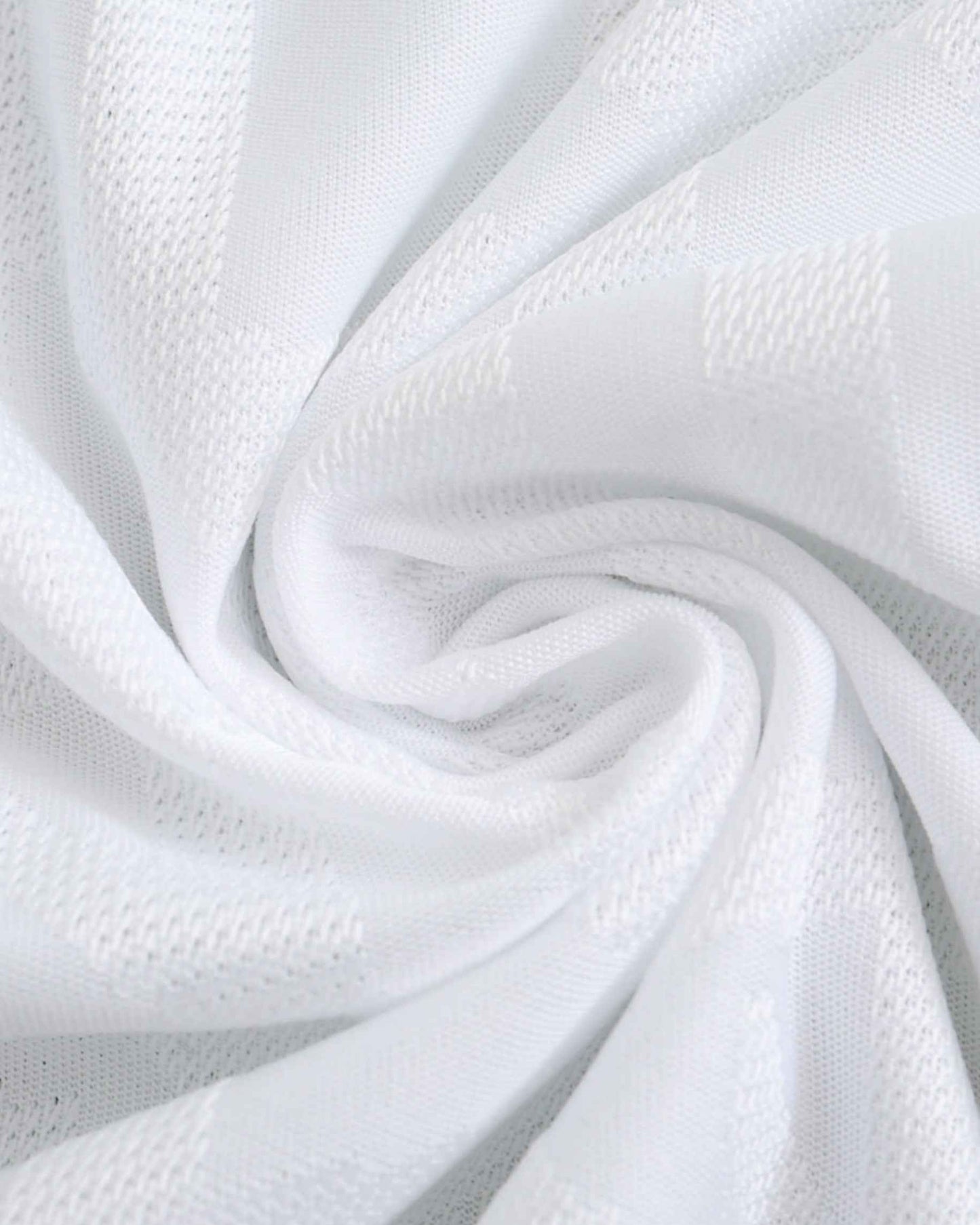 White and black textured fabric, likely a football jersey.
