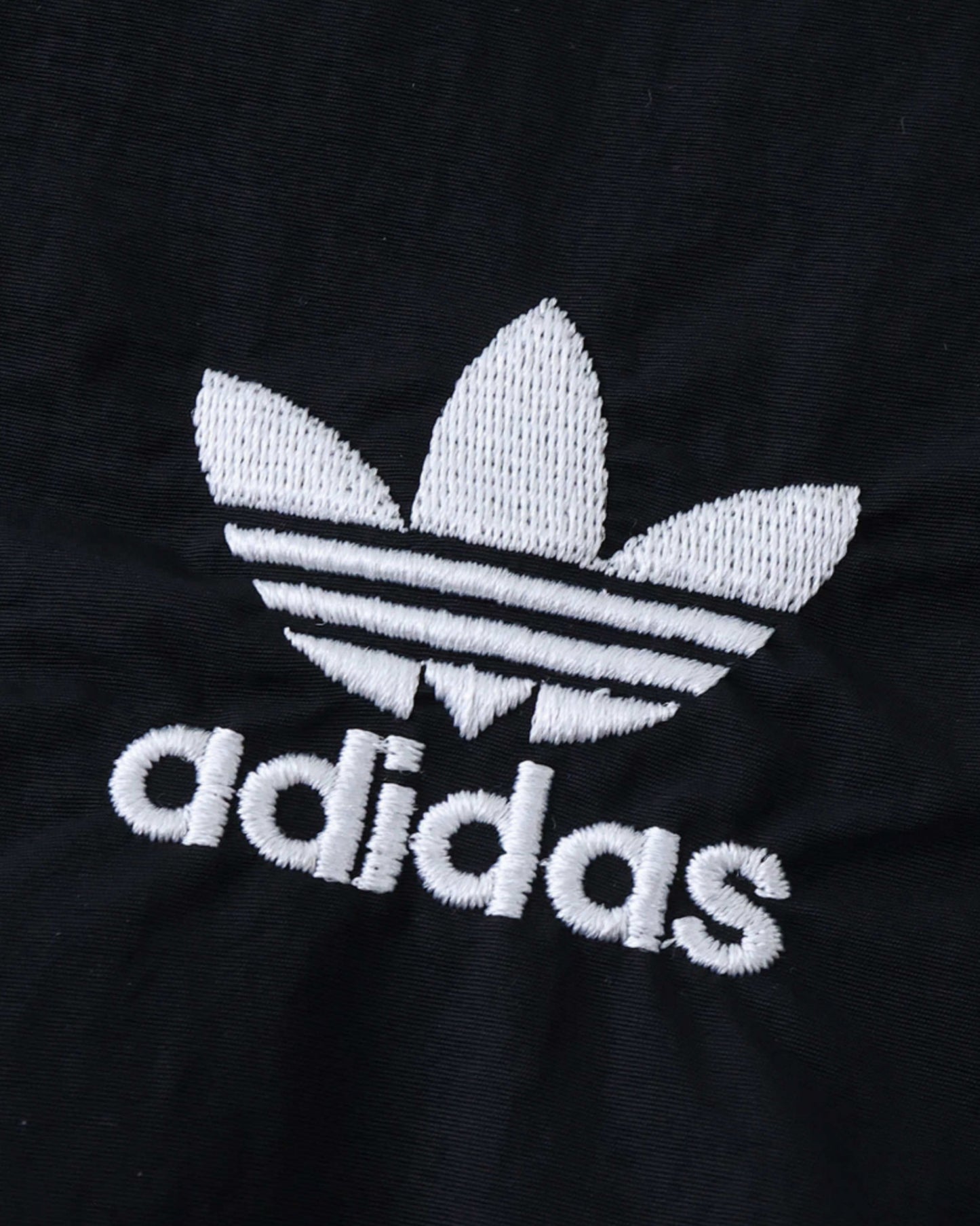 Adidas trefoil logo on black Germany football windbreaker 2024/25