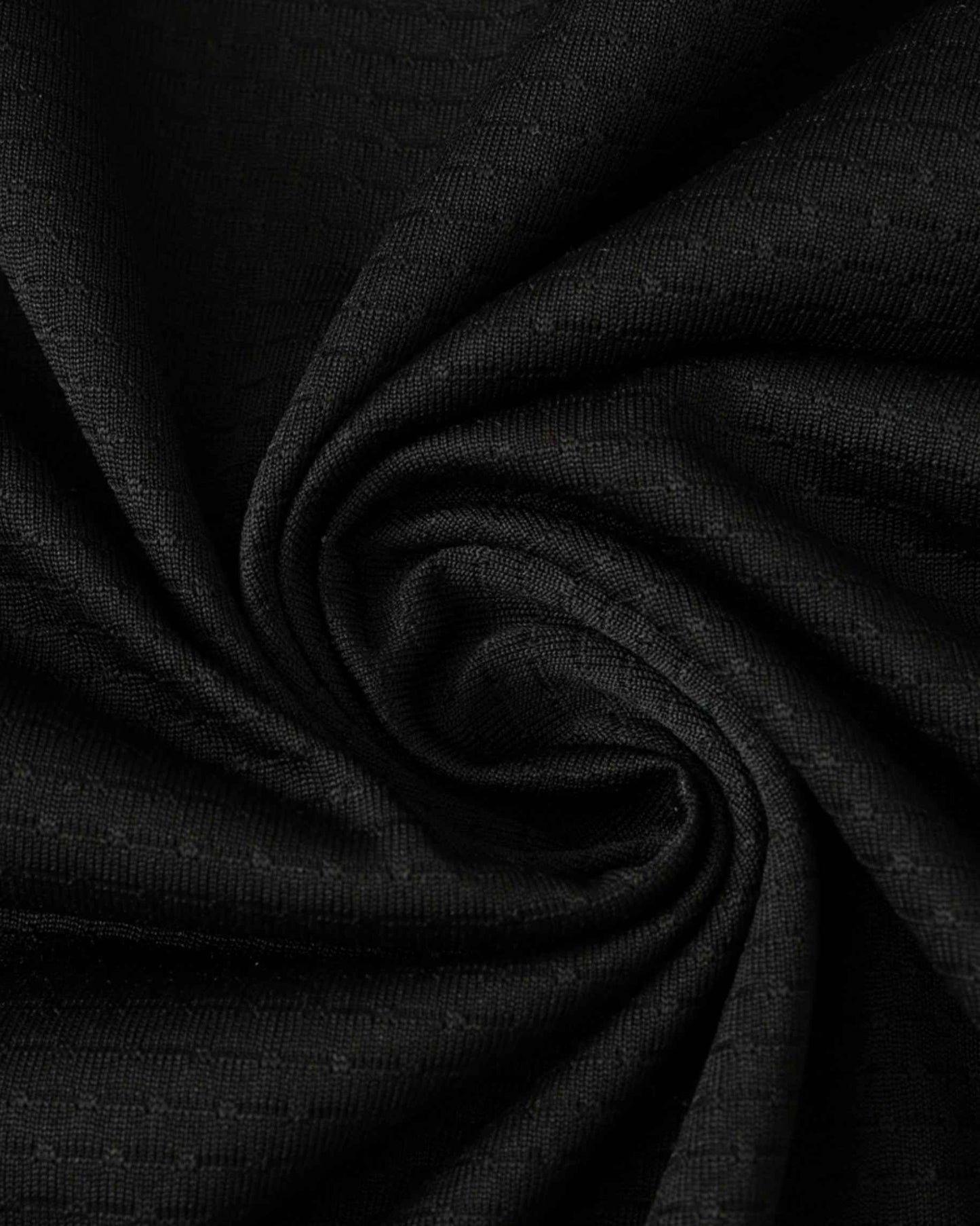Black Inter Miami away football jersey 2024/25 close-up of subtle diamond textured fabric