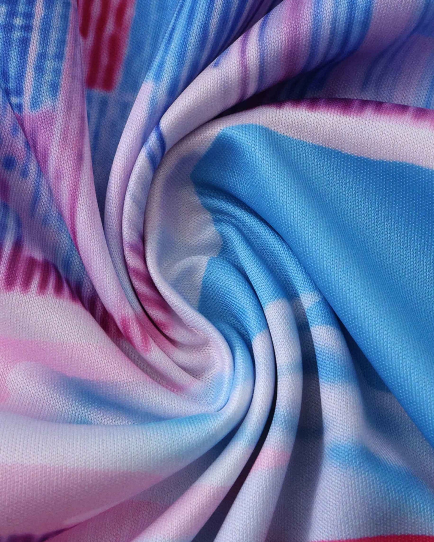 Close-up of the pink and blue watercolour knit fabric on the Inter Miami Beach Town football jersey