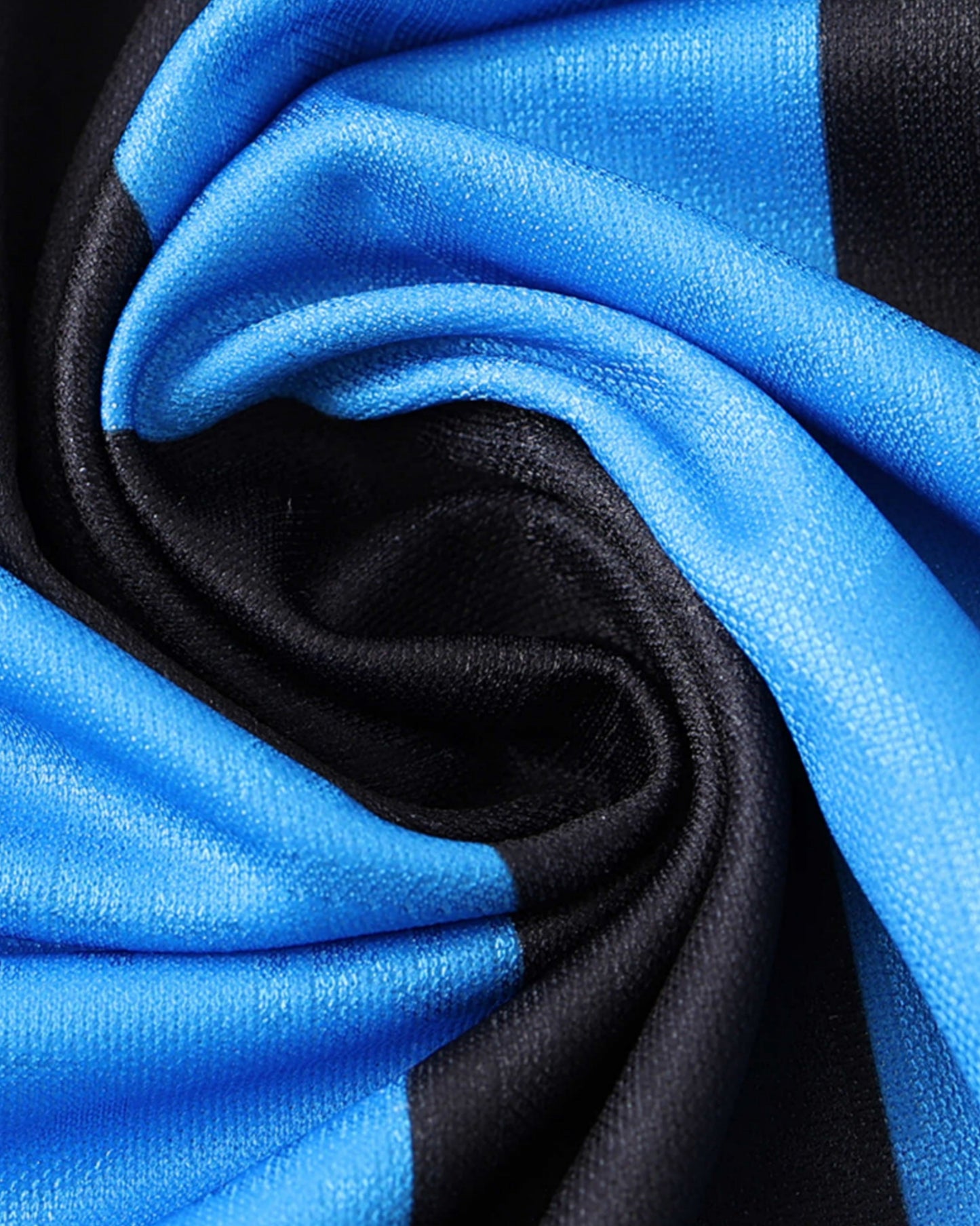 Close-up of the blue and black striped fabric of the Inter Milan 1992/93 retro home football jersey