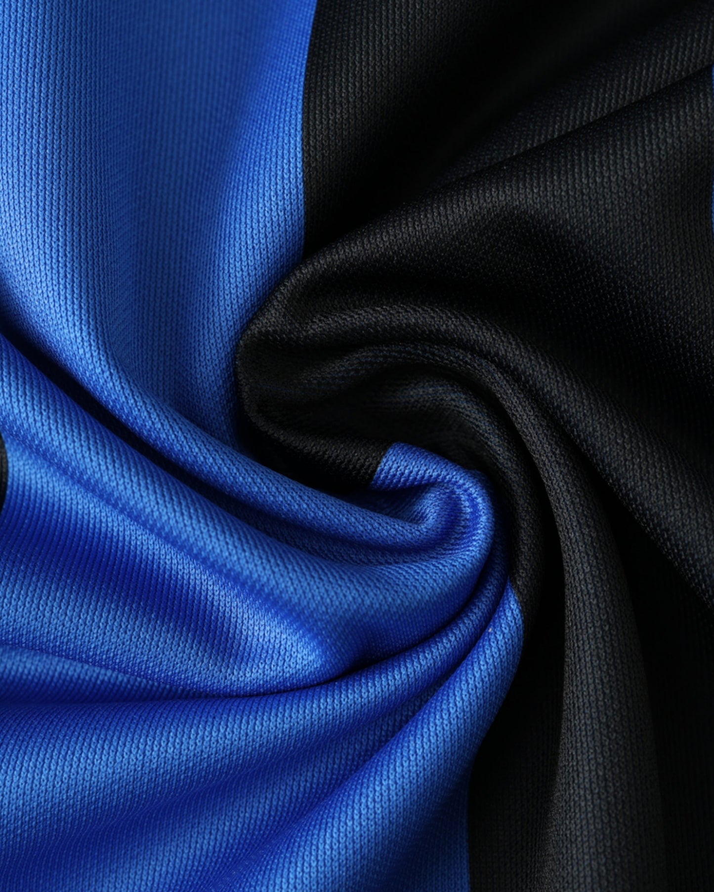 Inter Milan Ninja Turtle football jersey 2024 close-up of blue and black textured pinstripe fabric