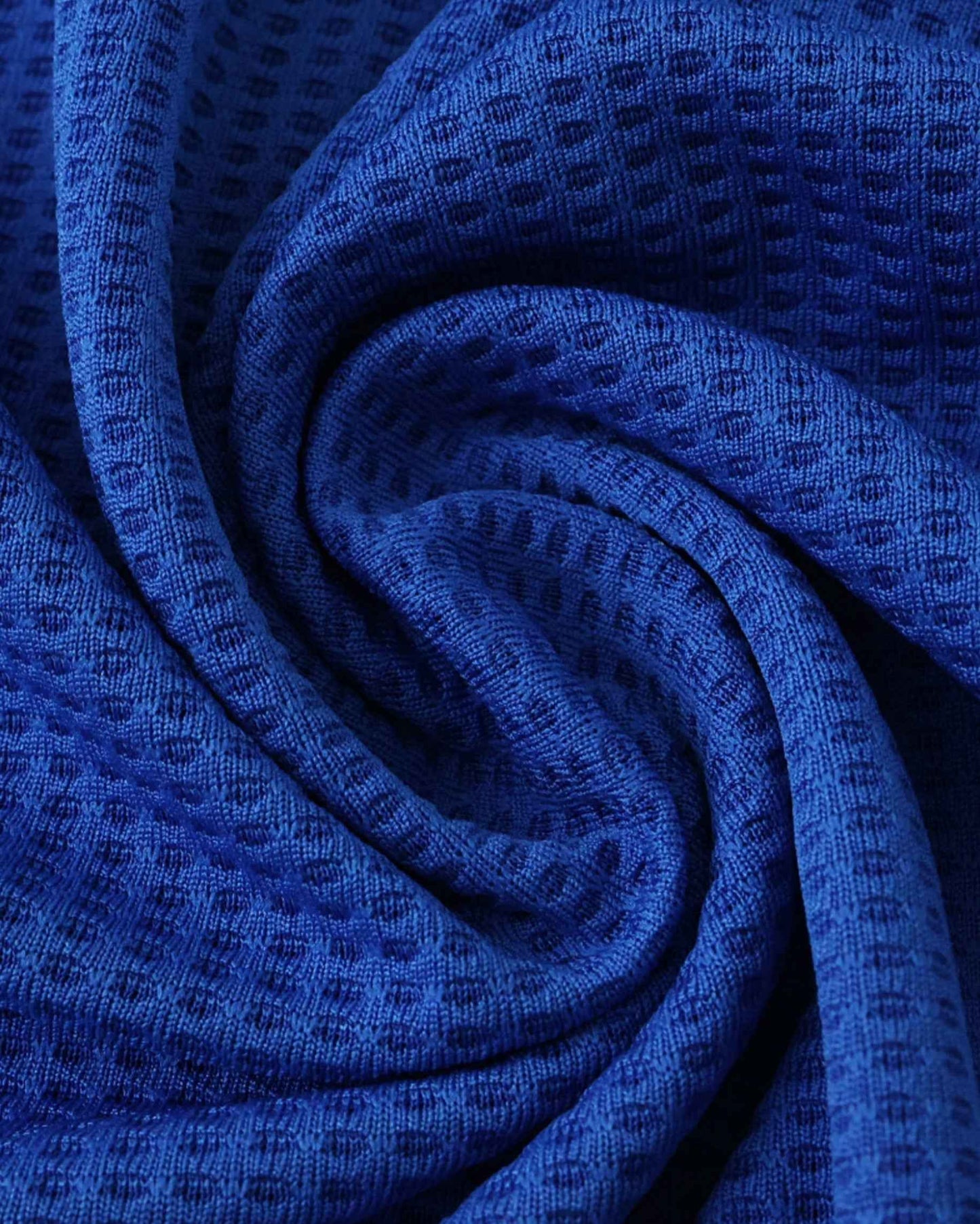 Blue textured performance fabric detail of Italy home football jersey 2024/25