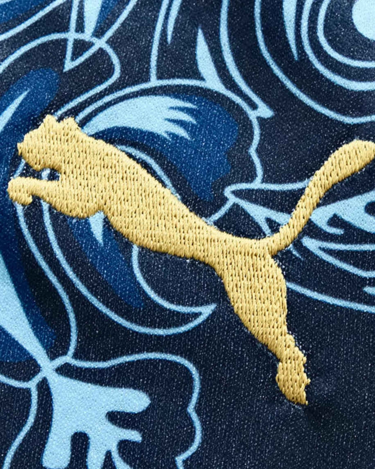 Gold Puma logo on navy Italy x Versace football jersey with light-blue baroque pattern