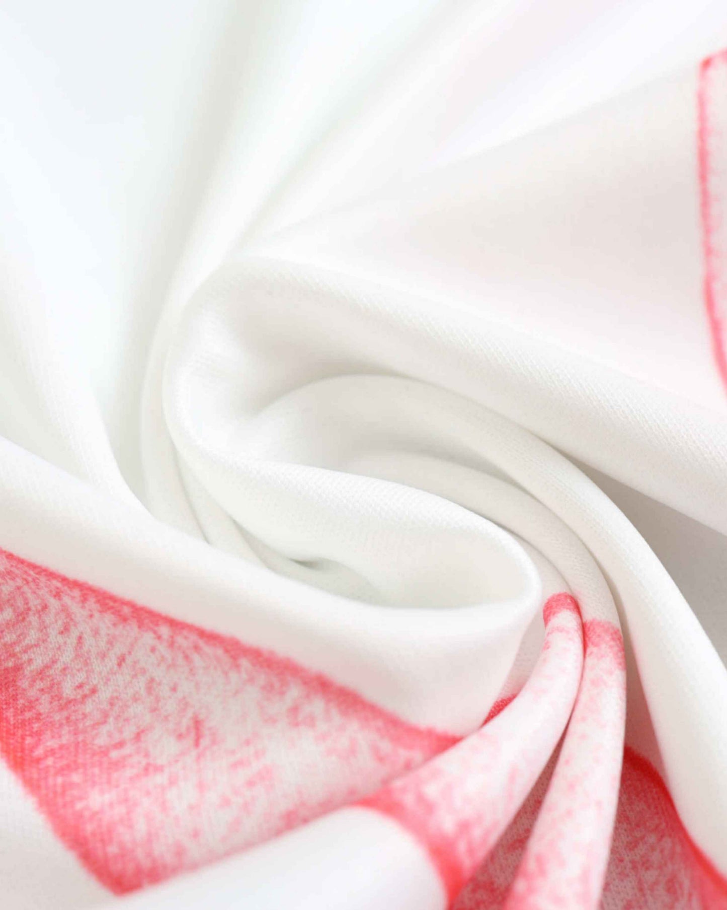White fabric with red abstract pattern