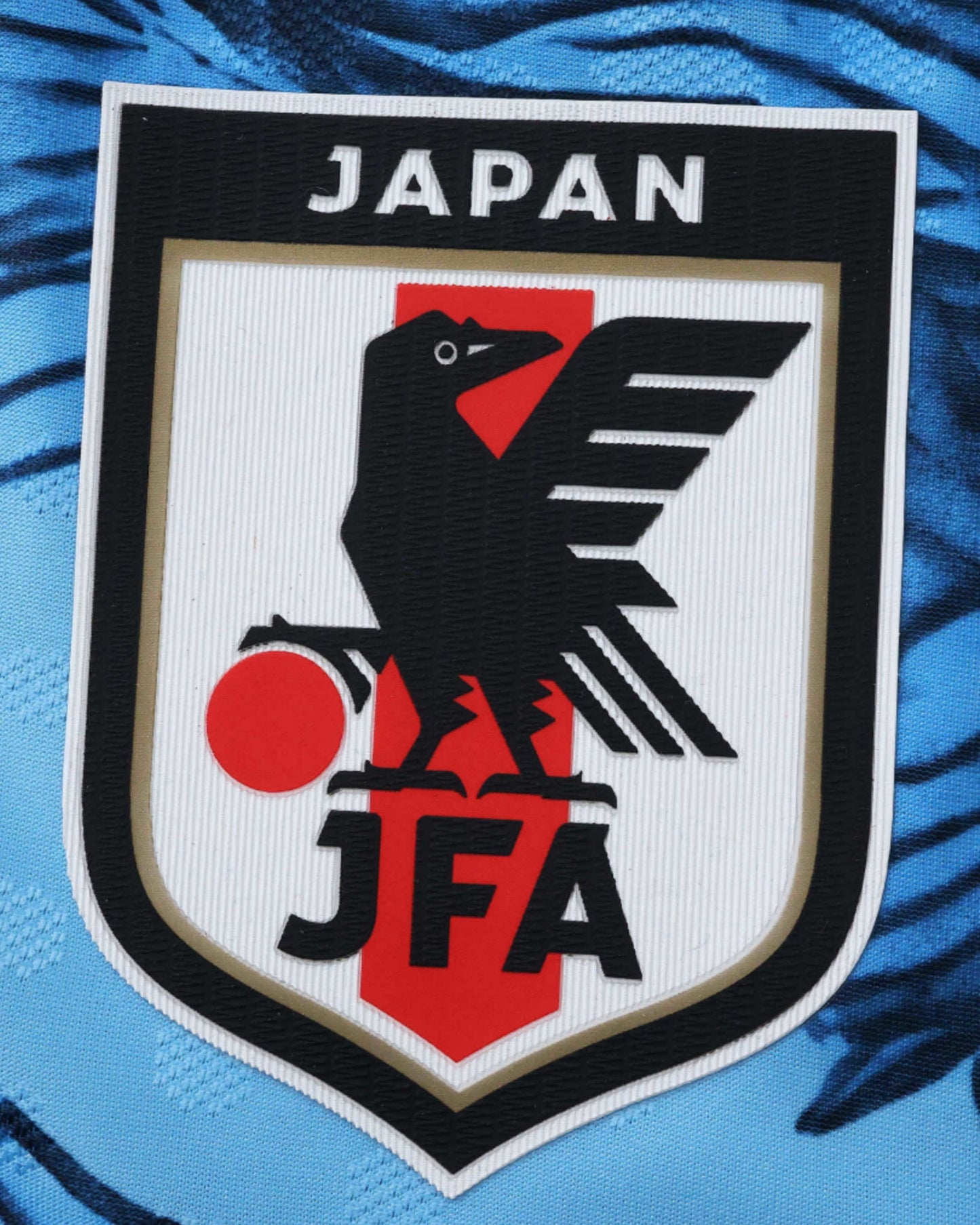 Japan Dynasty blue football jersey close-up of Y-3 logo and JFA crest on dragon artwork