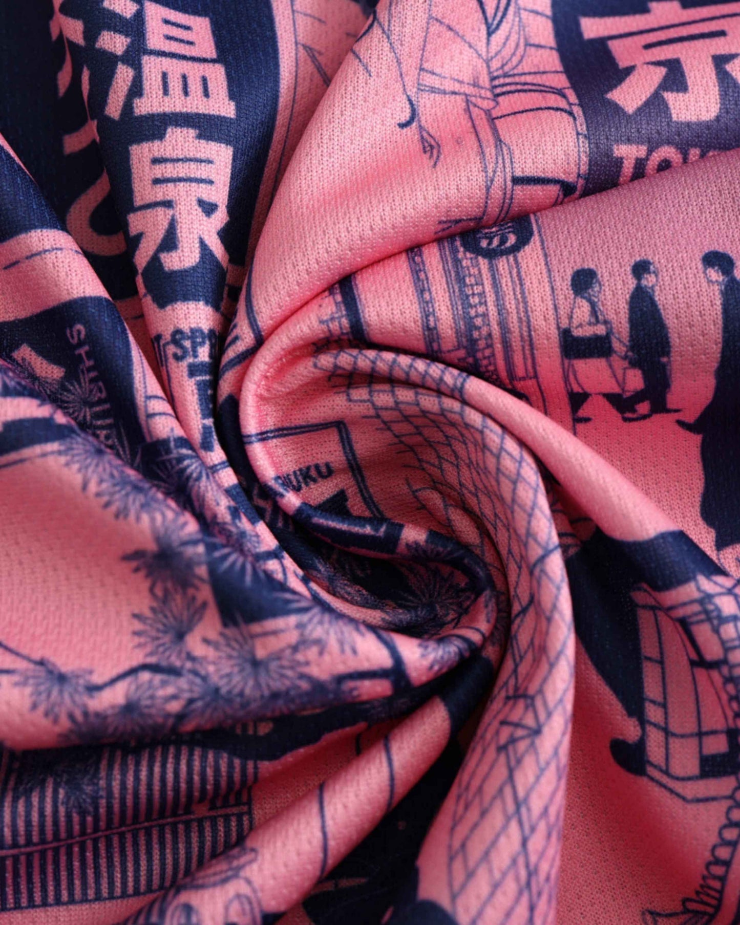 Pink fabric with a dark blue Japanese-inspired print.