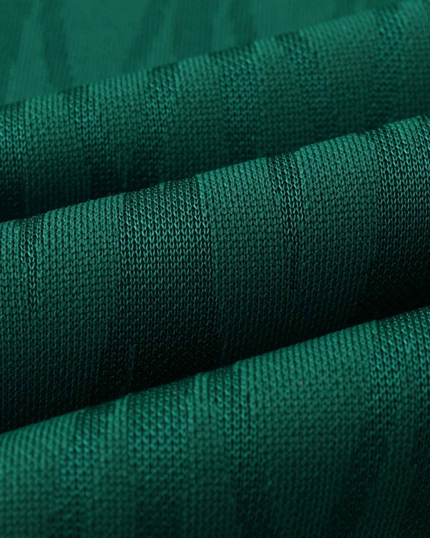Detail of green textured fabric on Mexico retro home football jersey 2010/11