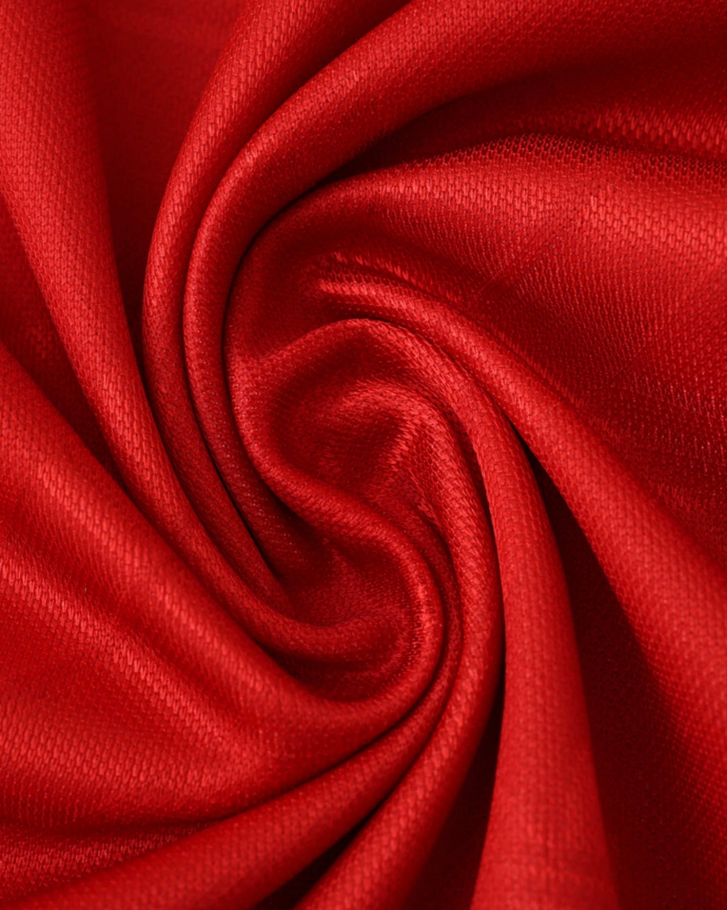 Close-up of red Portugal retro home football jersey 1992/93 fabric with diagonal stripe pattern