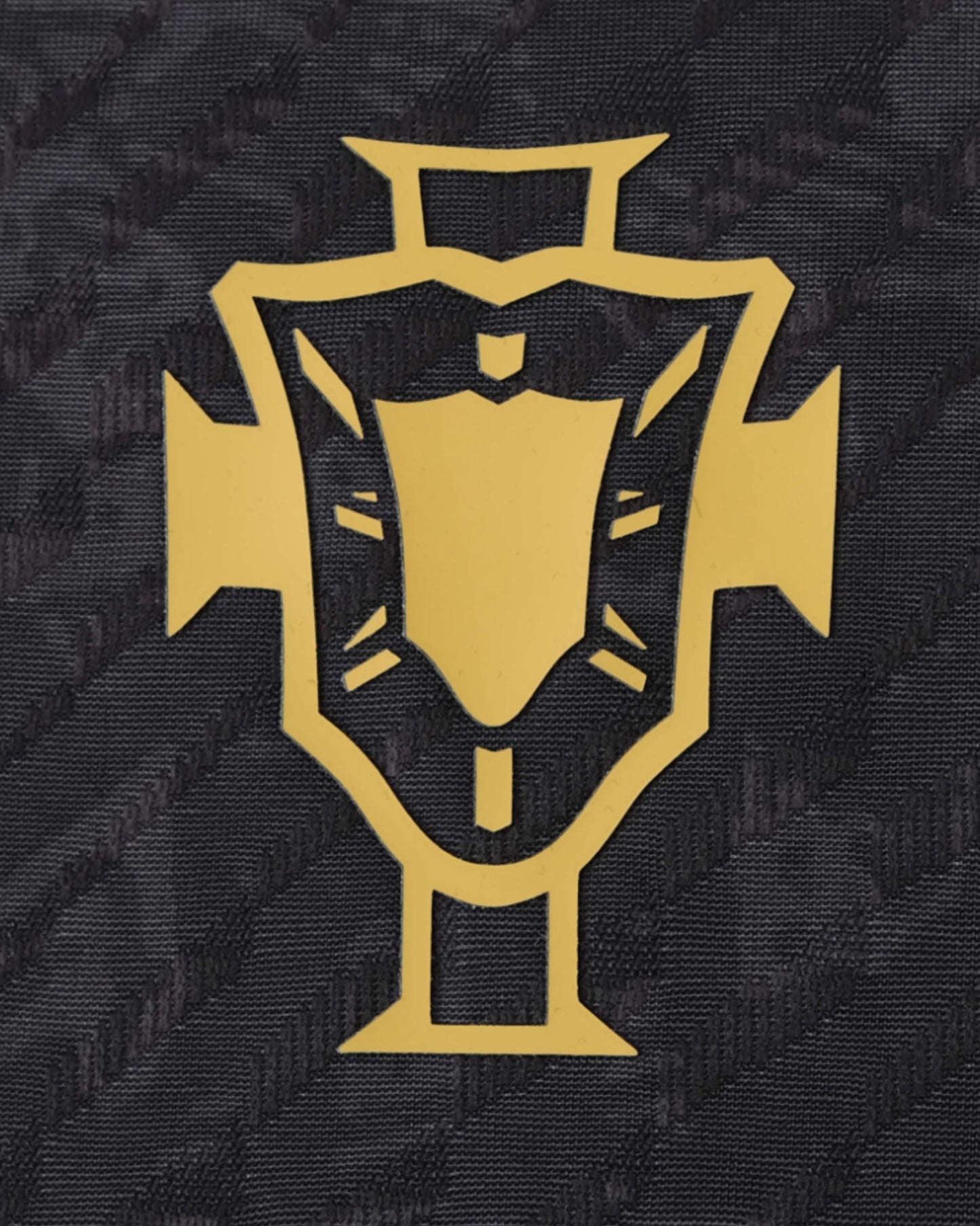 Gold Portugal crest on black textured Portugal x The Siu premium home football kit