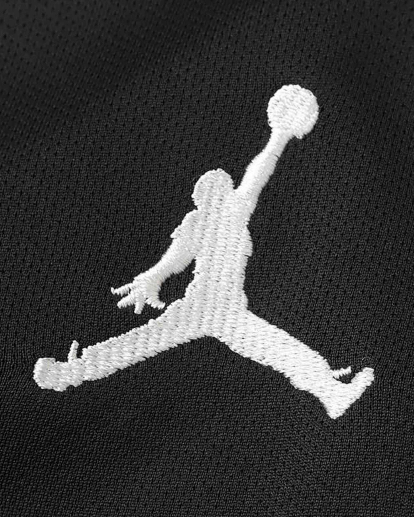 Black football jersey with white Jumpman logo.