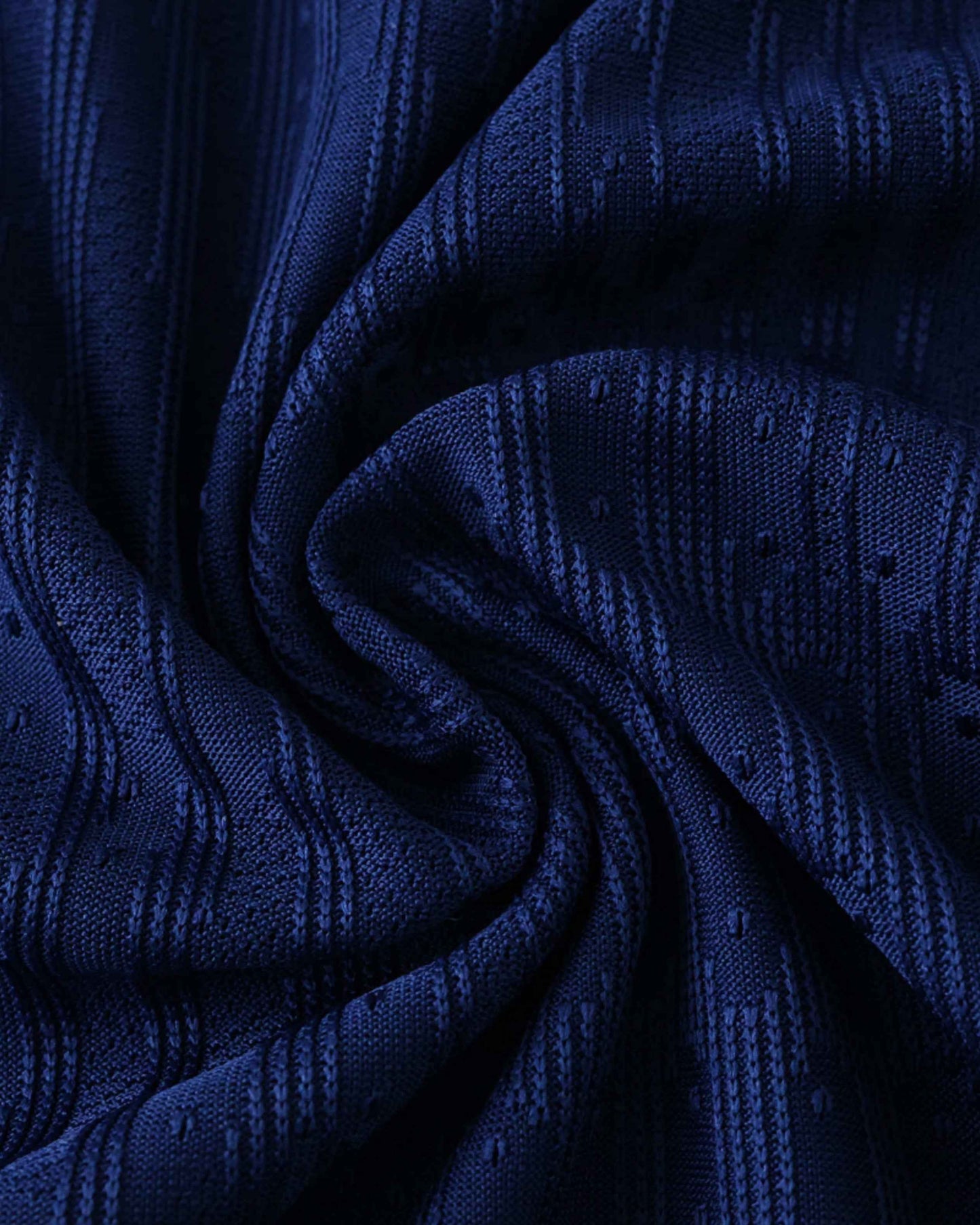 Paris Saint-Germain blue football jersey with textured stripes.