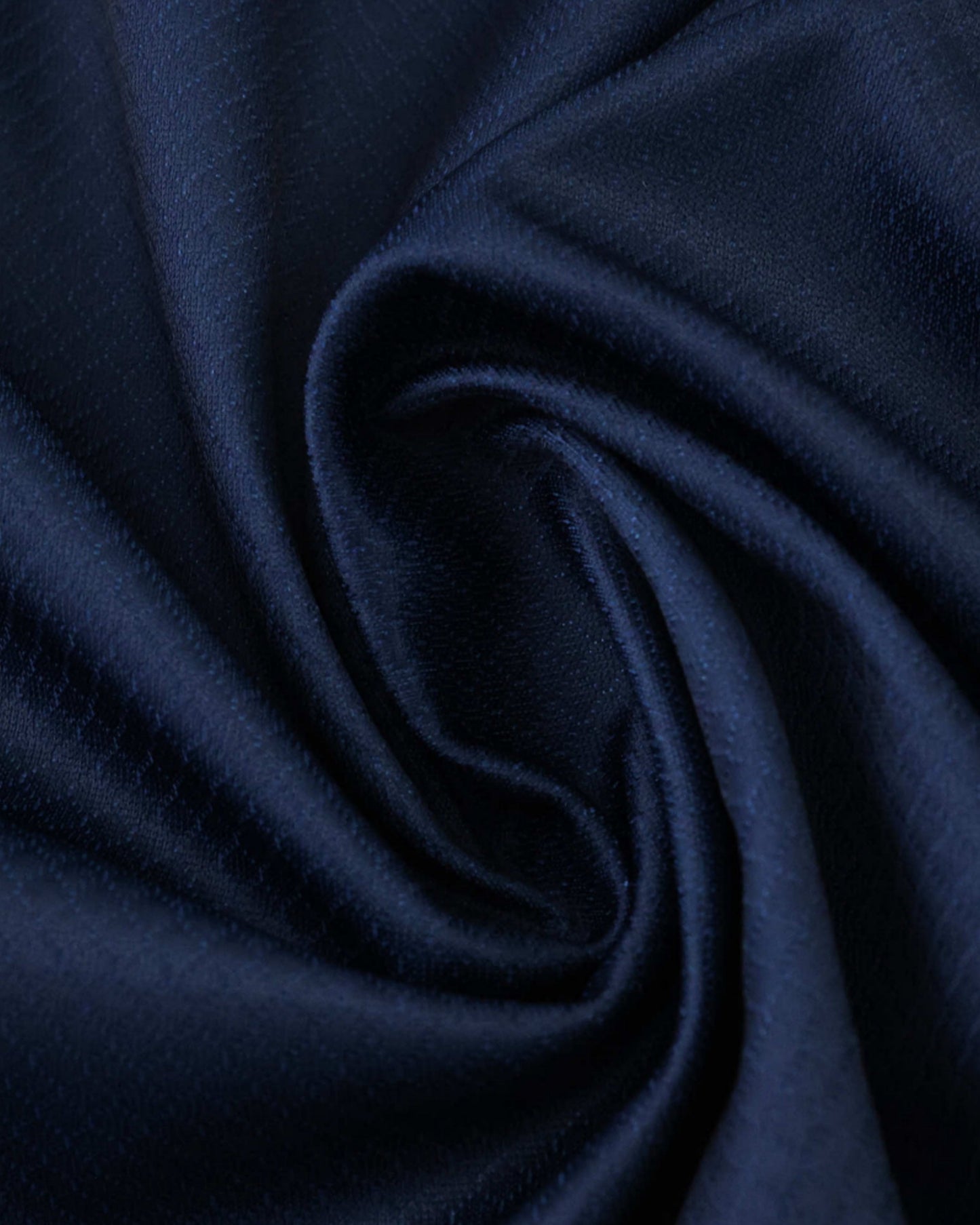 Textured navy fabric detail of the PSG x The Weeknd football jersey
