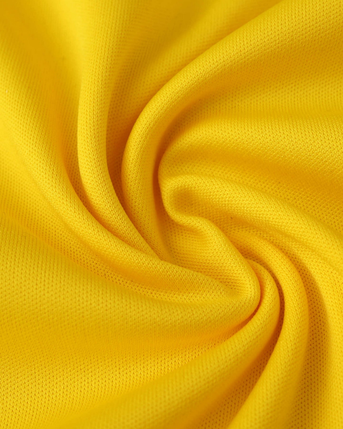 Real Madrid 2011/12 retro goalkeeper football jersey close-up of yellow woven fabric