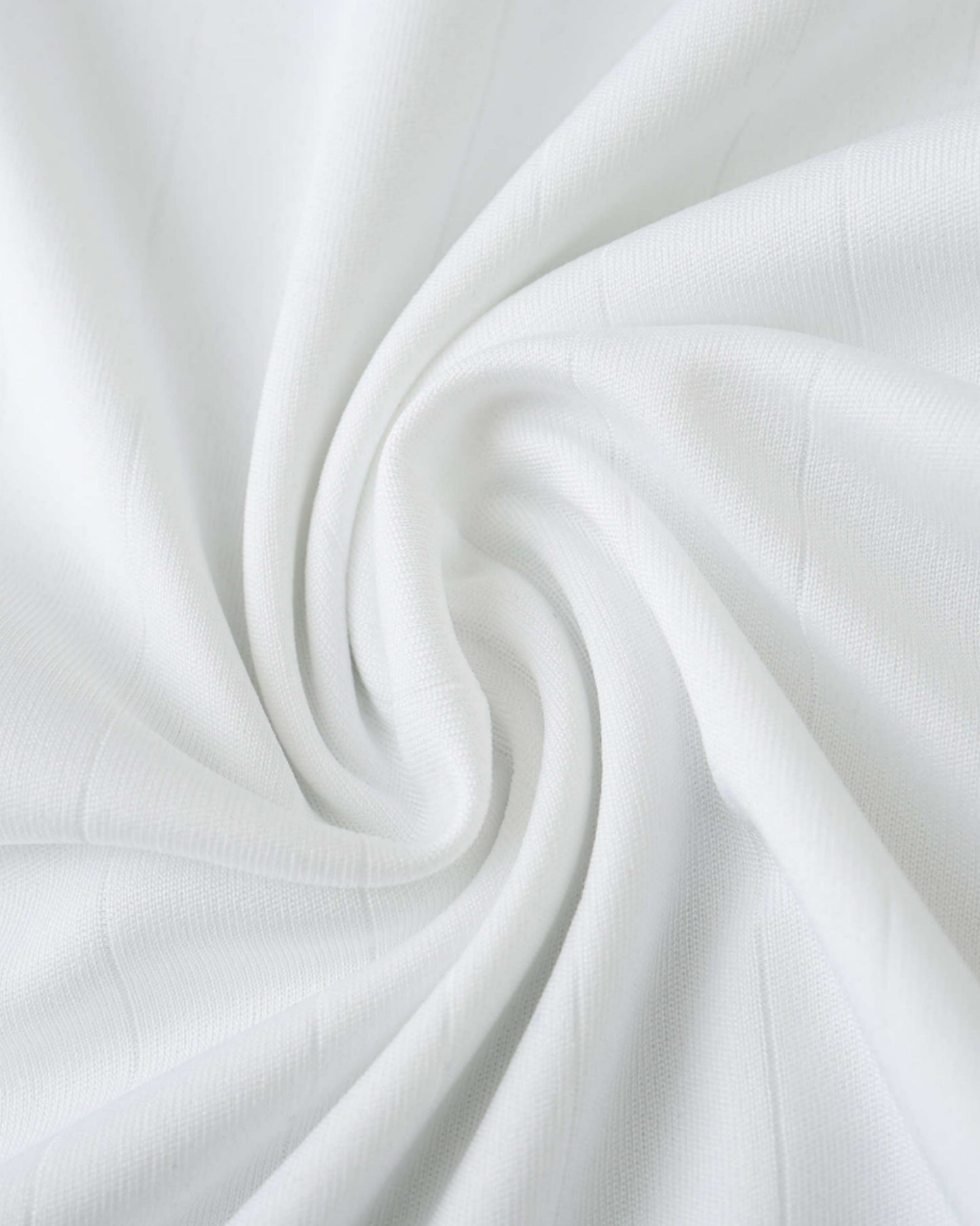 Close-up of the breathable white fabric of the Real Madrid 2006/07 retro home football jersey