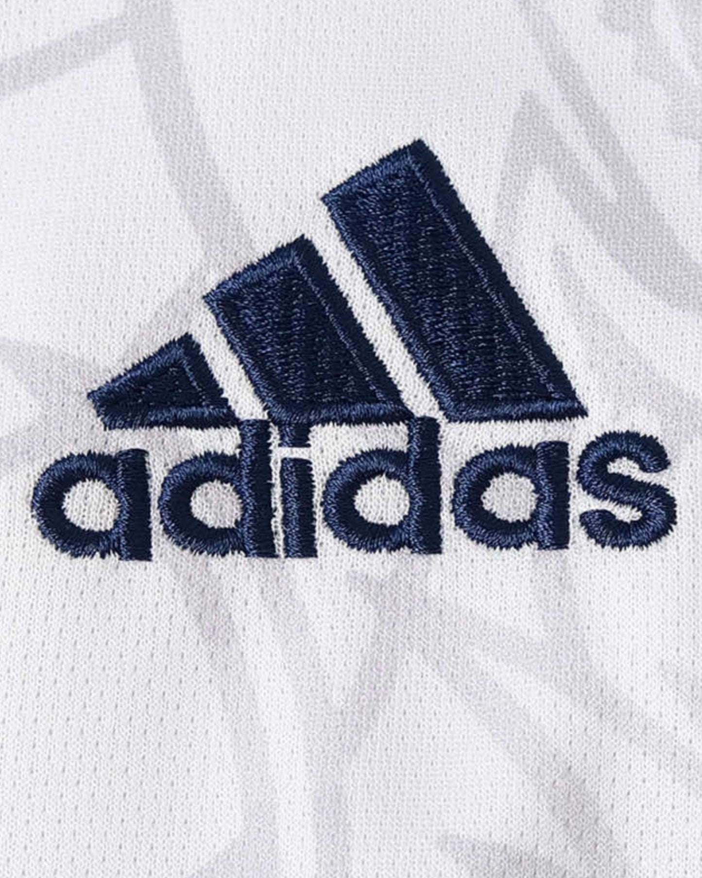Real Madrid Dragon Blanco football jersey navy Adidas logo on white dragon-print fabric