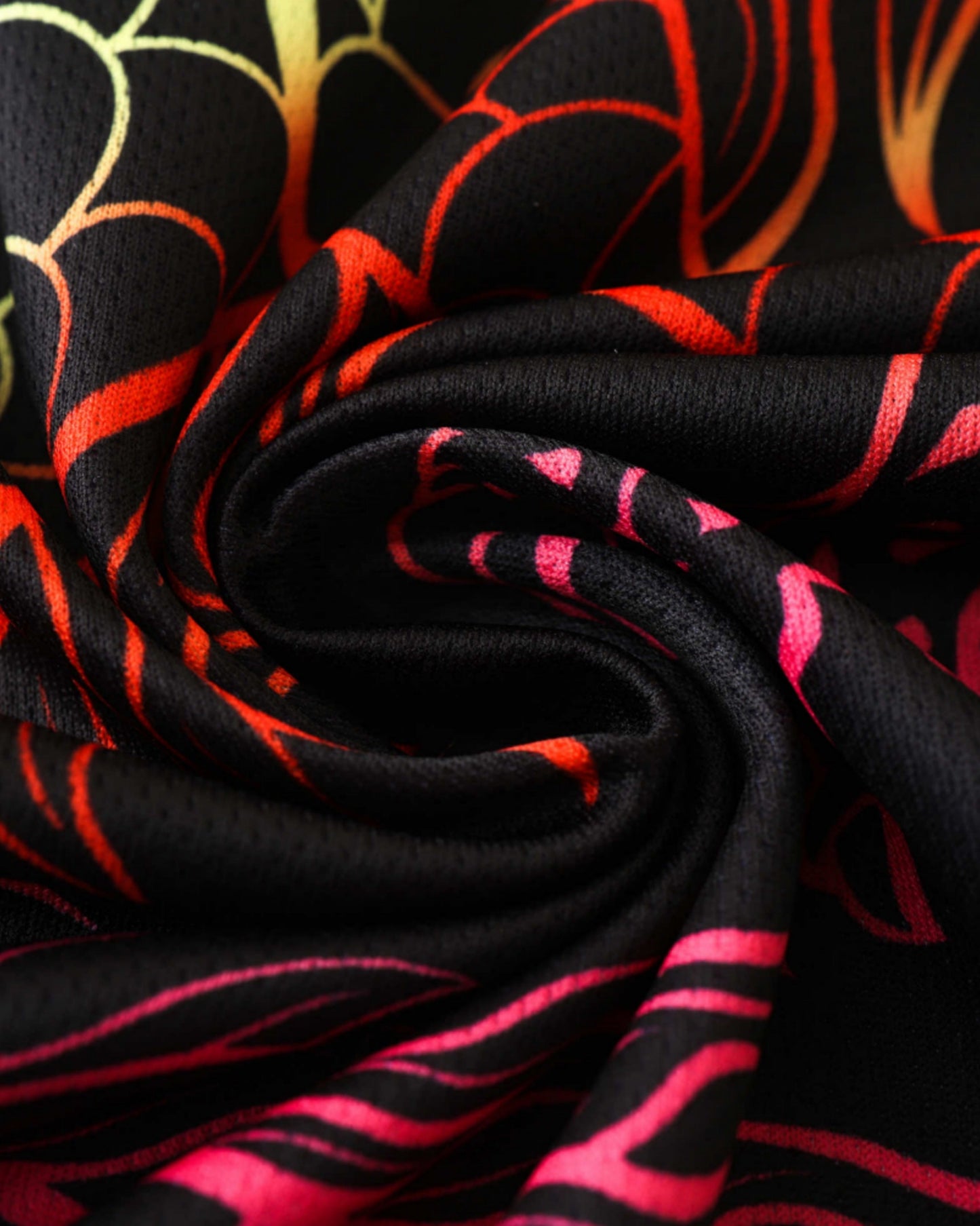 Real Madrid Rainbow Dragon football jersey close-up of red and yellow dragon fabric print