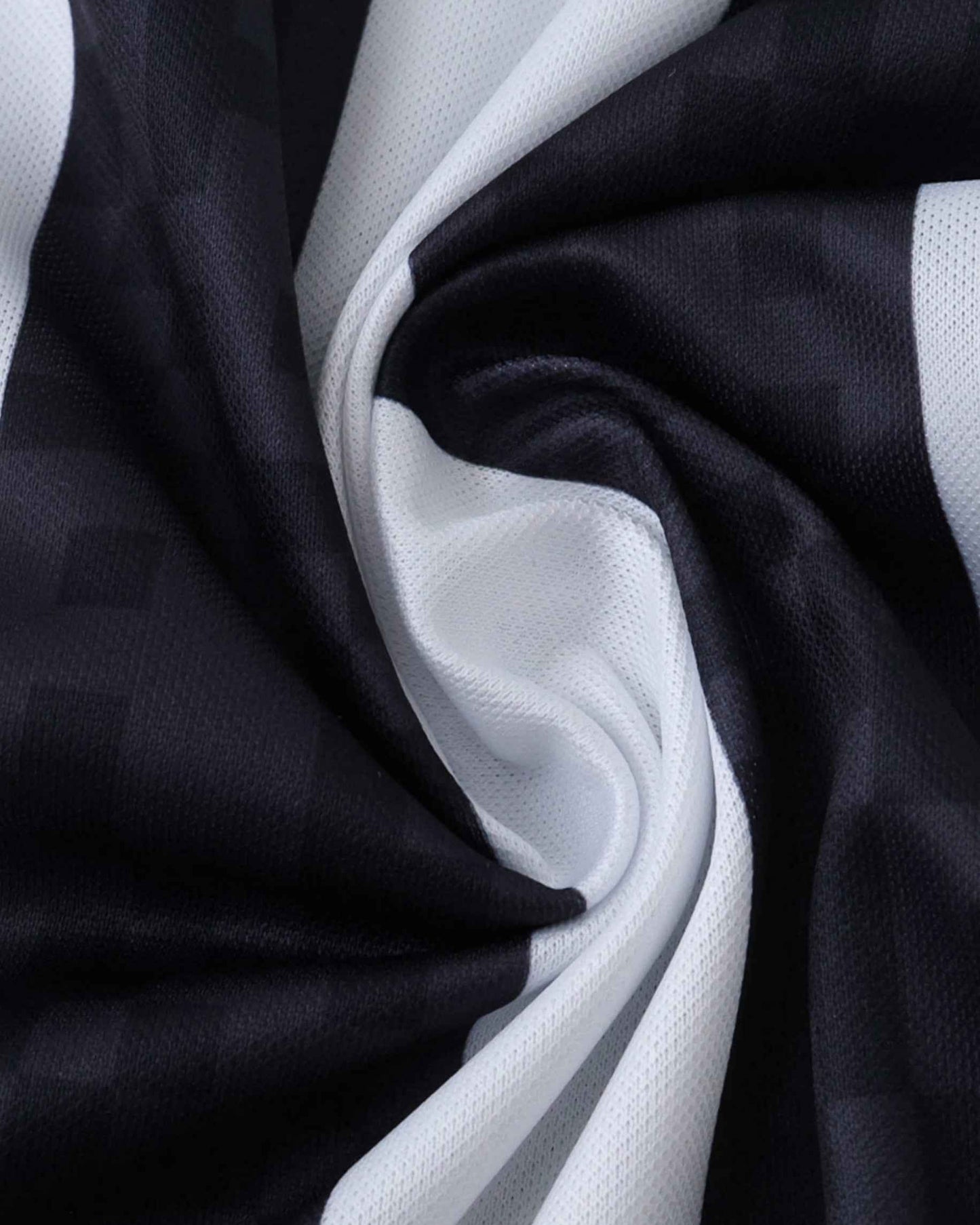 Black and white striped fabric texture of the Santos away football jersey 2025/26
