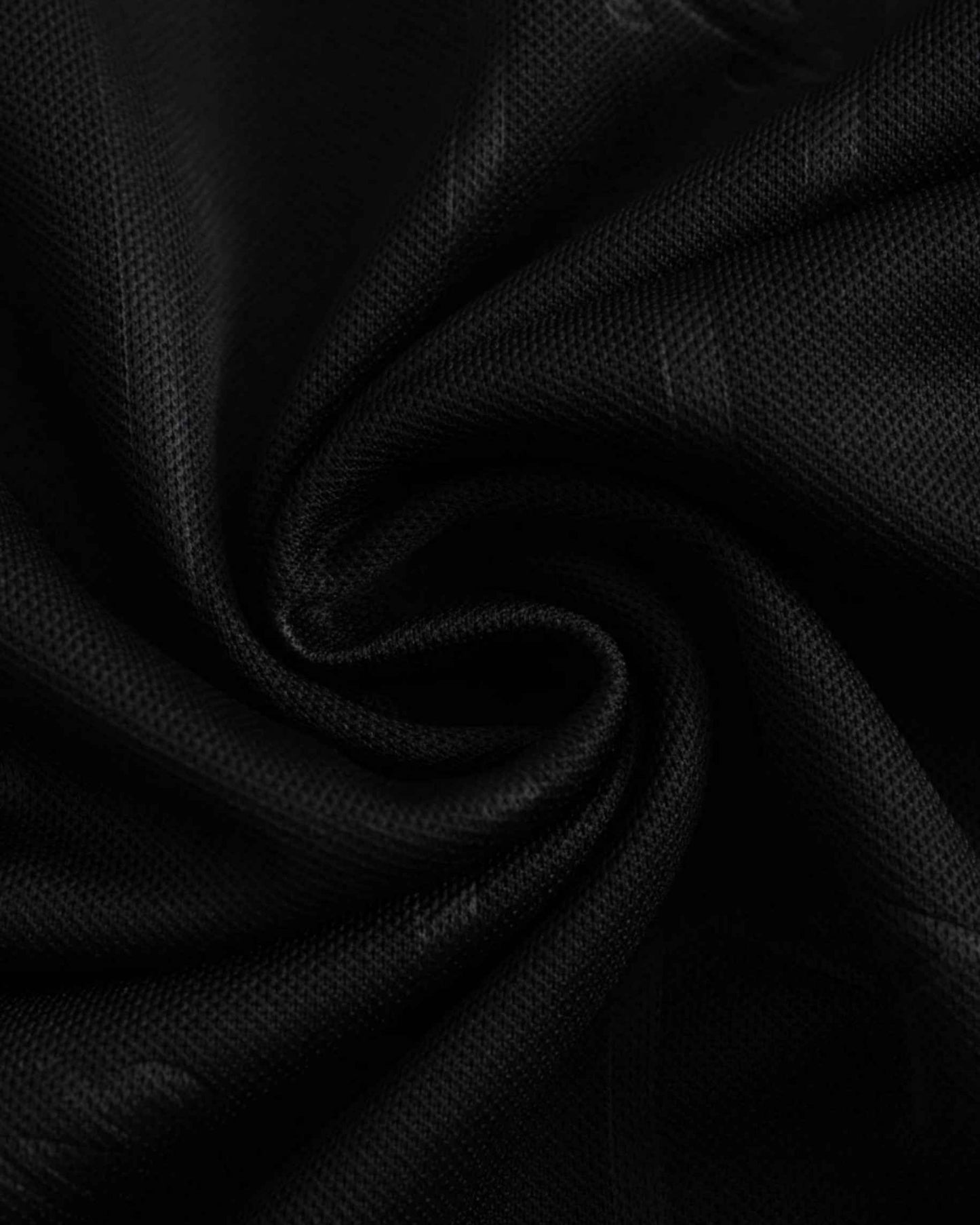 Black textured pinstripe fabric of the Santos x Charlie Brown Jr premium football jersey