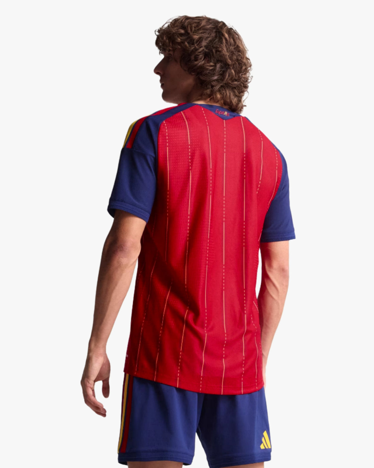 Back view of red Spain home football jersey 2026 with navy sleeves and yellow trim