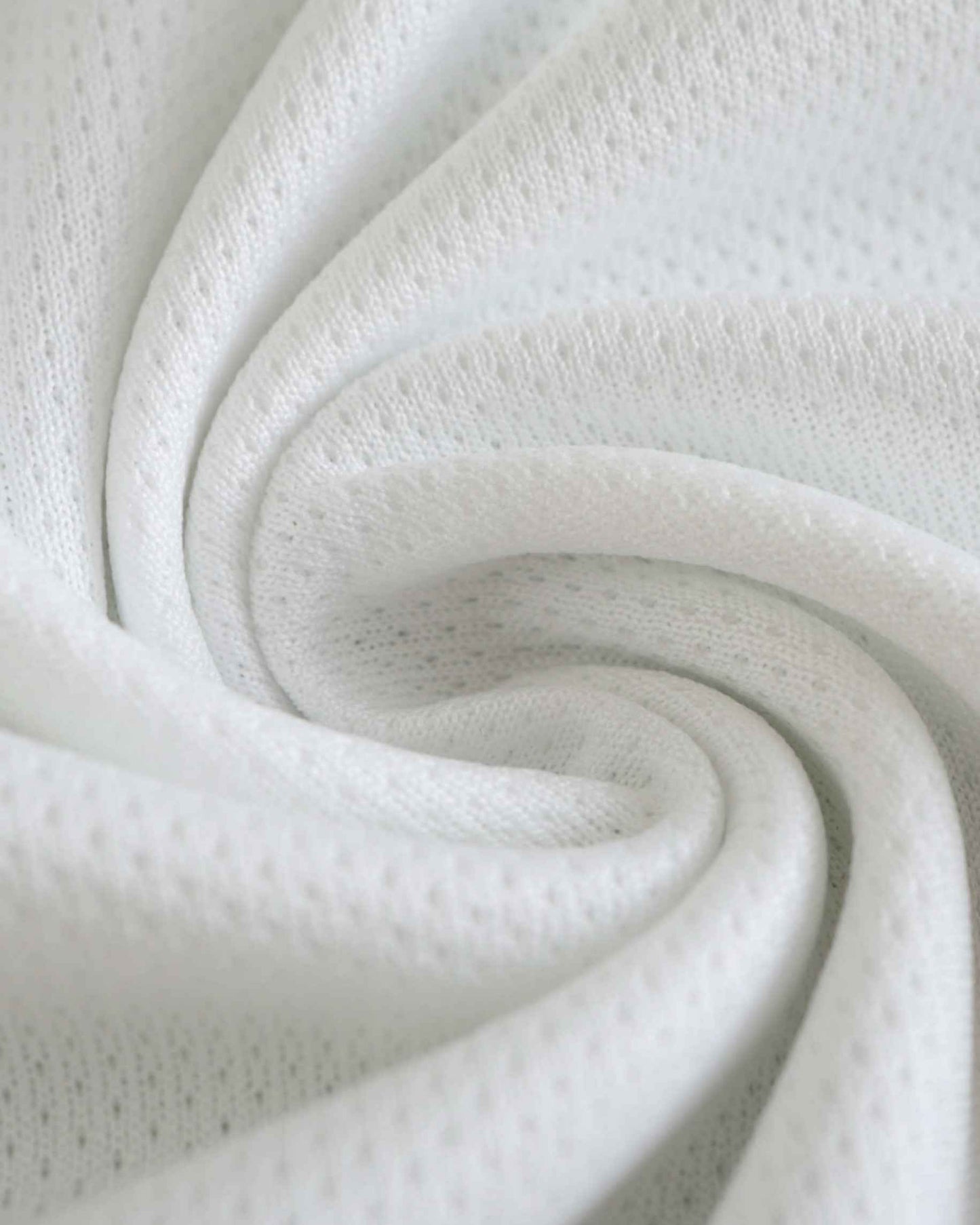 White textured fabric close-up of the Spain 1996/97 retro third football jersey