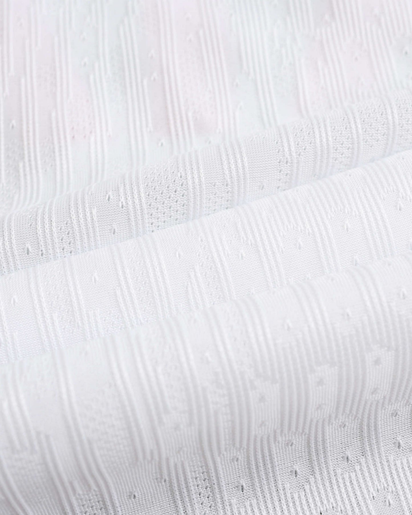 Close-up of the white ribbed fabric on the Tottenham Hotspur 2024/25 home jersey