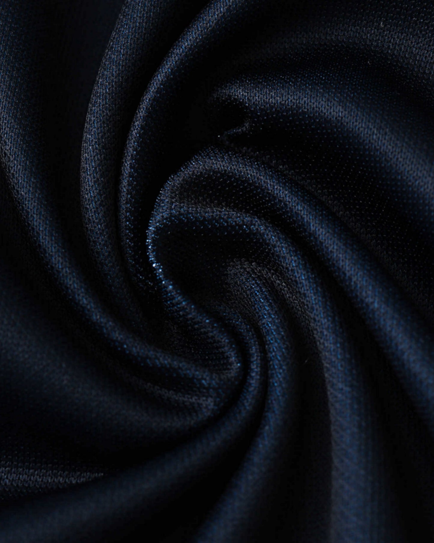 Close-up of the black and purple fabric on the Tottenham Hotspur 1994/95 retro away football shirt