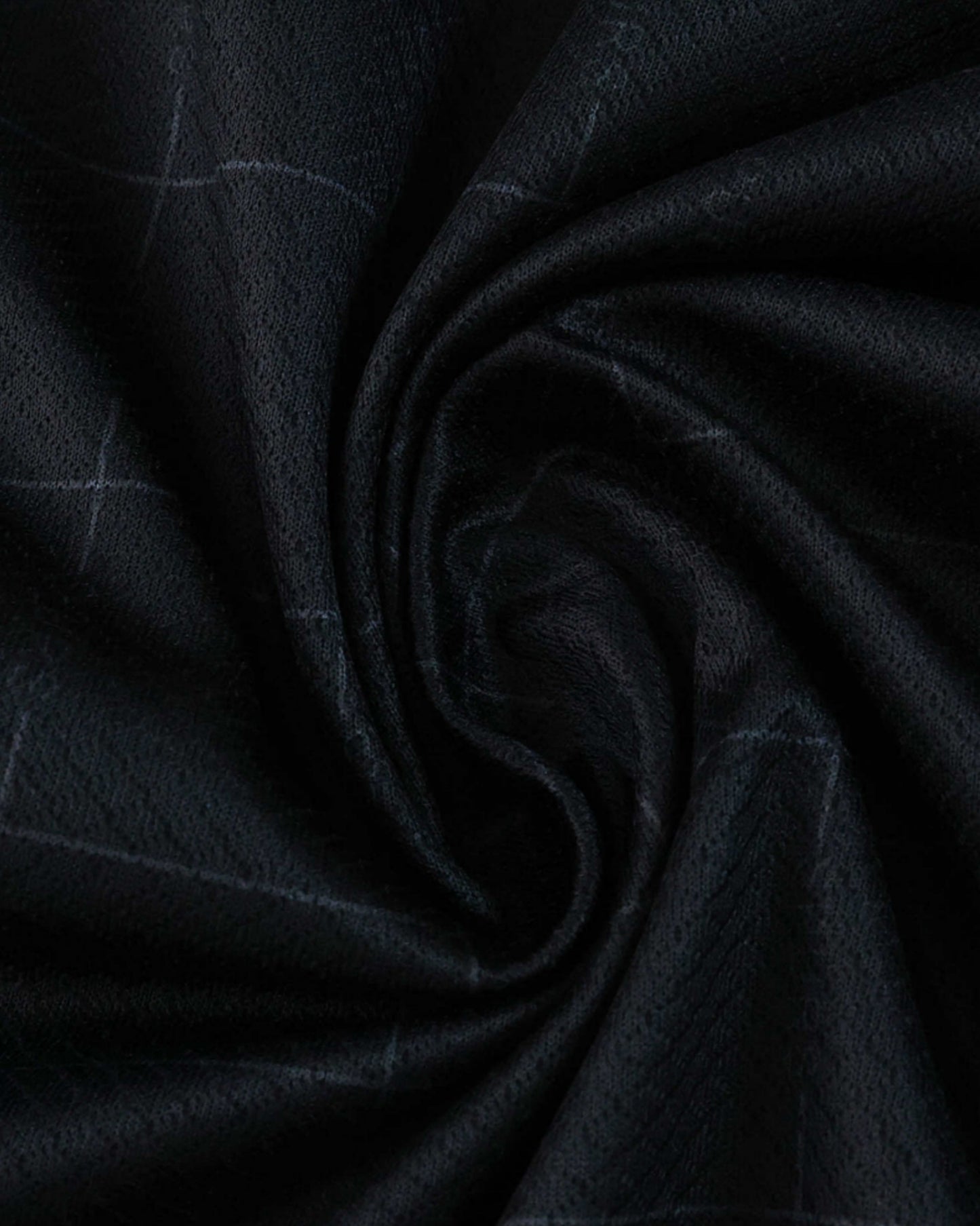 Tottenham Hotspur x Stray Kids football jersey collab close-up of black tonal grid fabric
