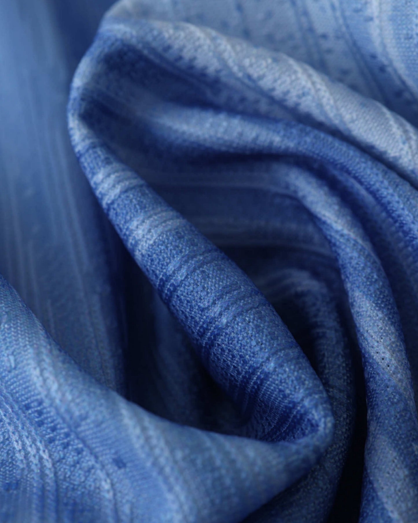 Tottenham x Travis Scott football jersey 2024 close-up of blue textured striped fabric